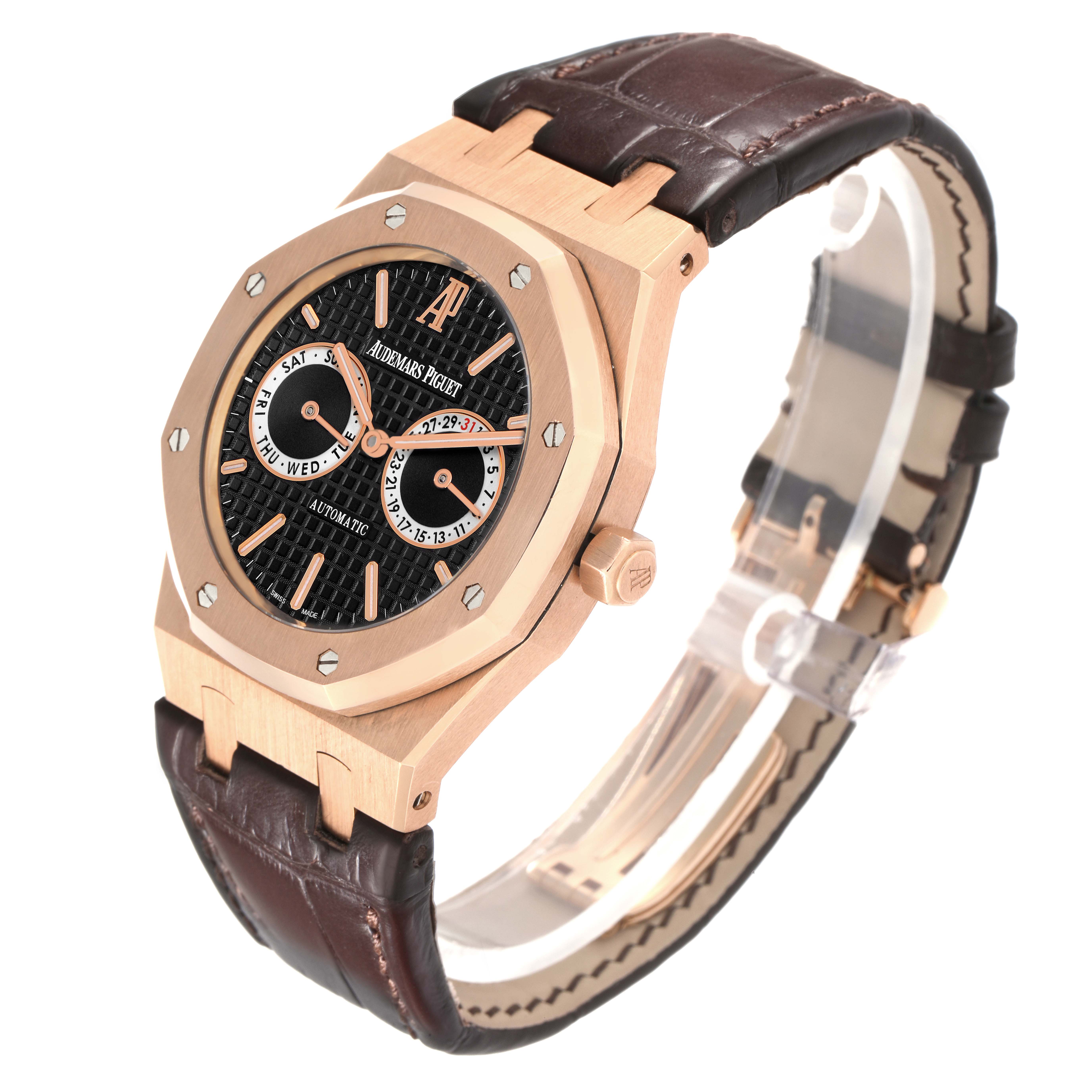 The Audemars Piguet Royal Oak 26330OR.OO.D088CR.01 Men
s Rose Gold Black Dial 26330OR.OO.D088CR.01 Men
s Rose Gold Black Dial watch is shown at a three-quarter angle, highlighting its case, dial, crown, and leather strap.