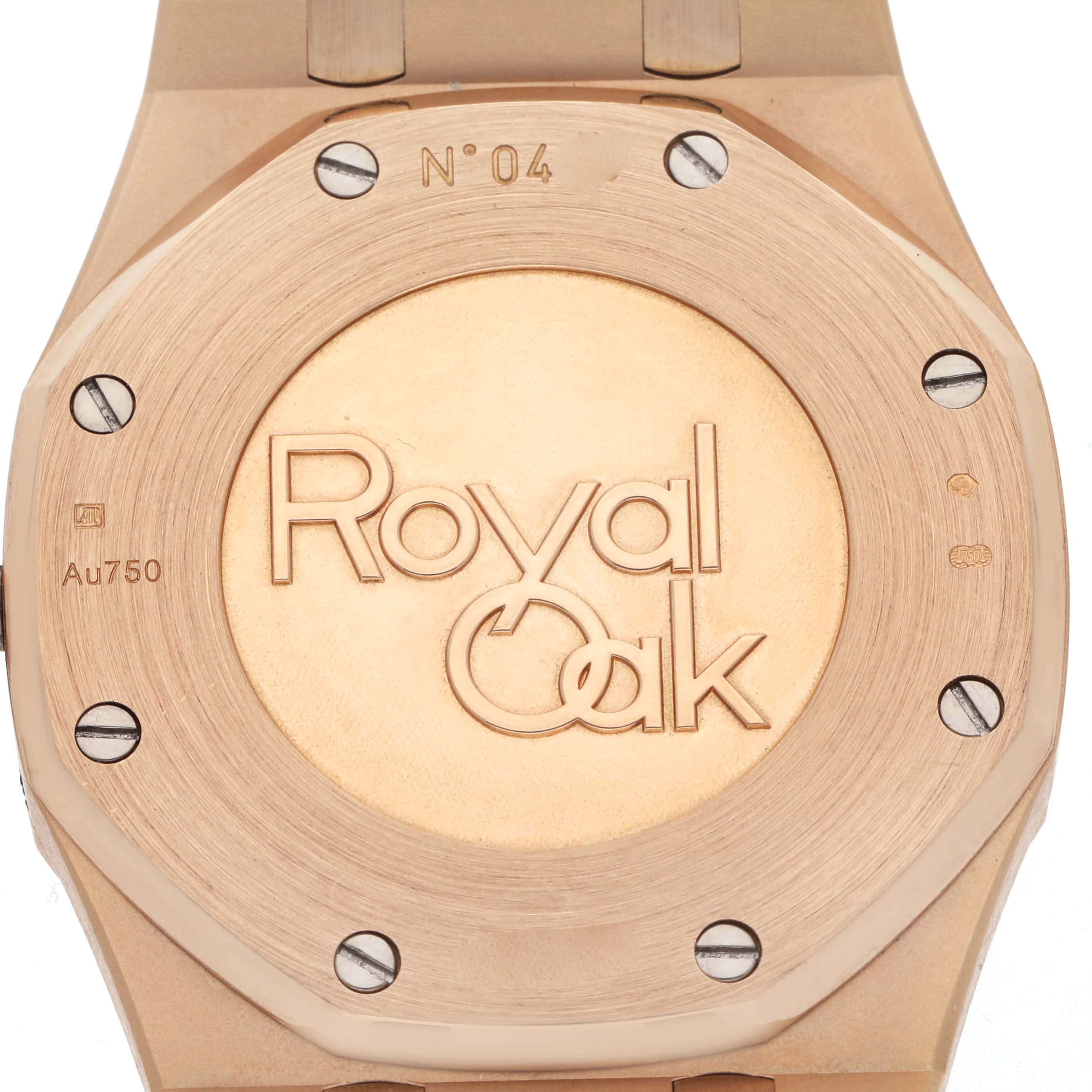 This image shows the case back of the Audemars Piguet Royal Oak 26330OR.OO.D088CR.01 Men
s Rose Gold Black Dial 26330OR.OO.D088CR.01 Men
s Rose Gold Black Dial, highlighting its engraved logo and screws.