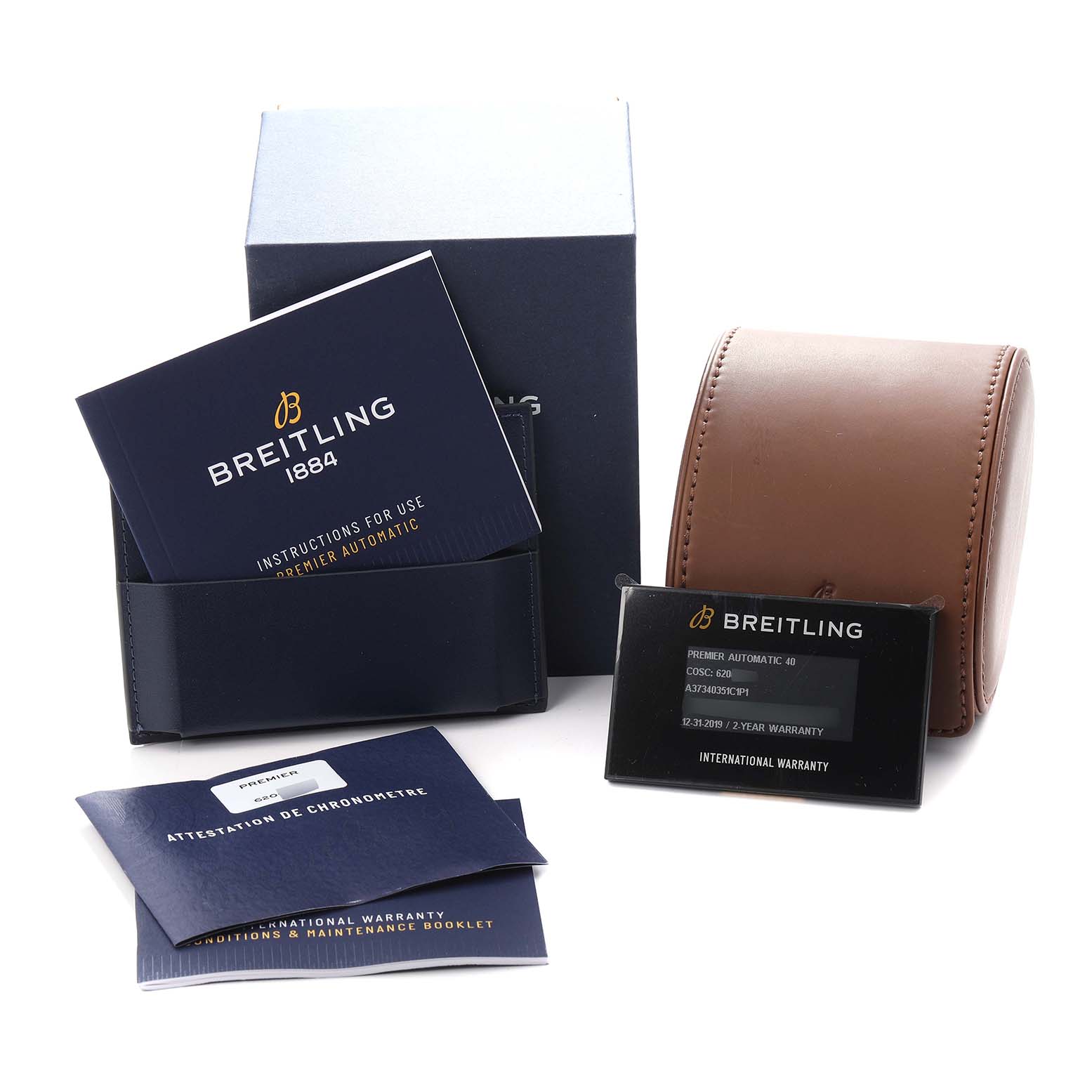 The image shows the Breitling Premier A37340351C1P1 Men
s Stainless Steel Blue Dial A37340351C1P1 Men
s Stainless Steel Blue Dial model packaging, warranty cards, instructions, and a leather watch case from a front angle.