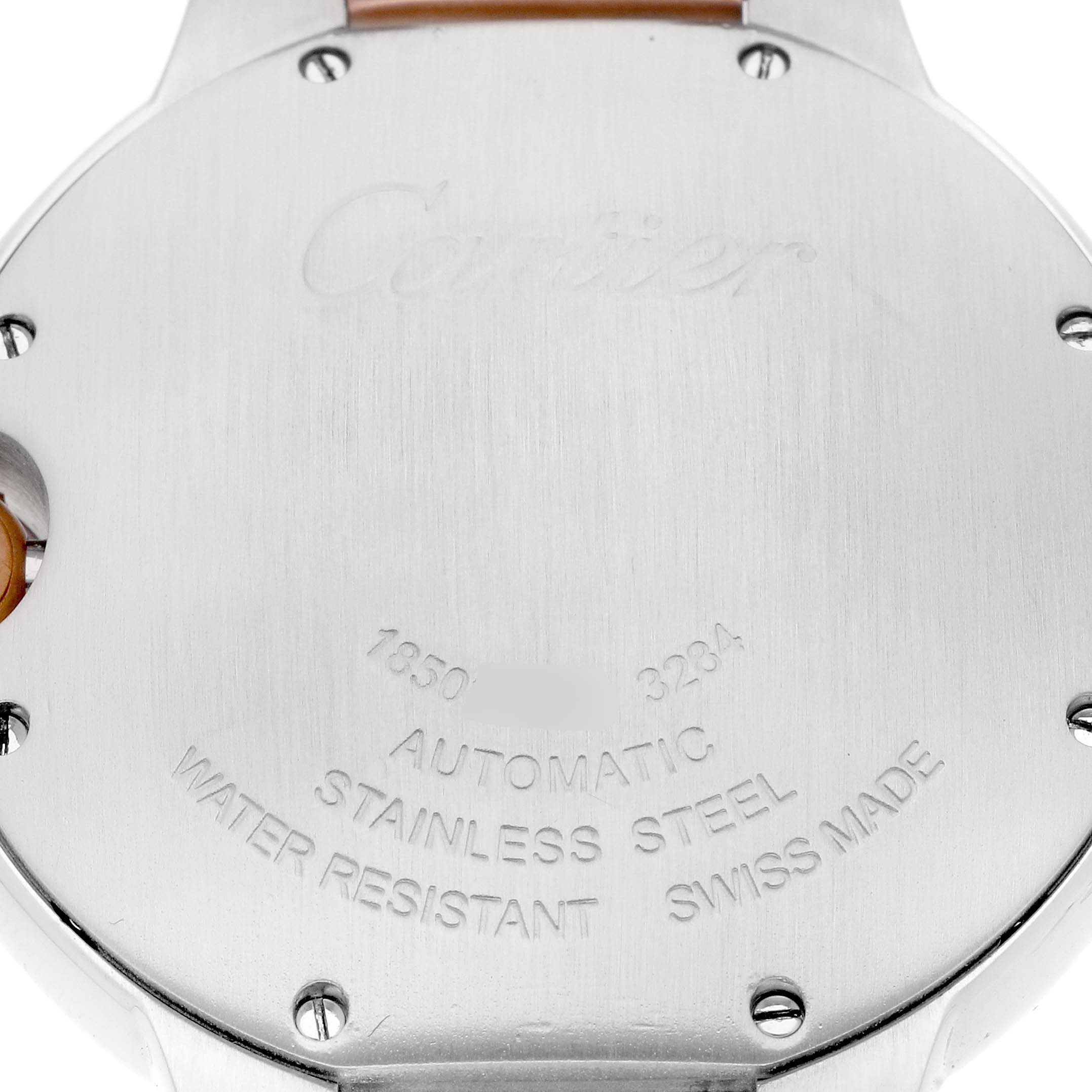 The image shows the back case of the Cartier Ballon Bleu W3BB0018 Men
s Steel and Gold (two tone) Silver Dial W3BB0018 Men
s Steel and Gold (two tone) Silver Dial watch, featuring engravings and screws.