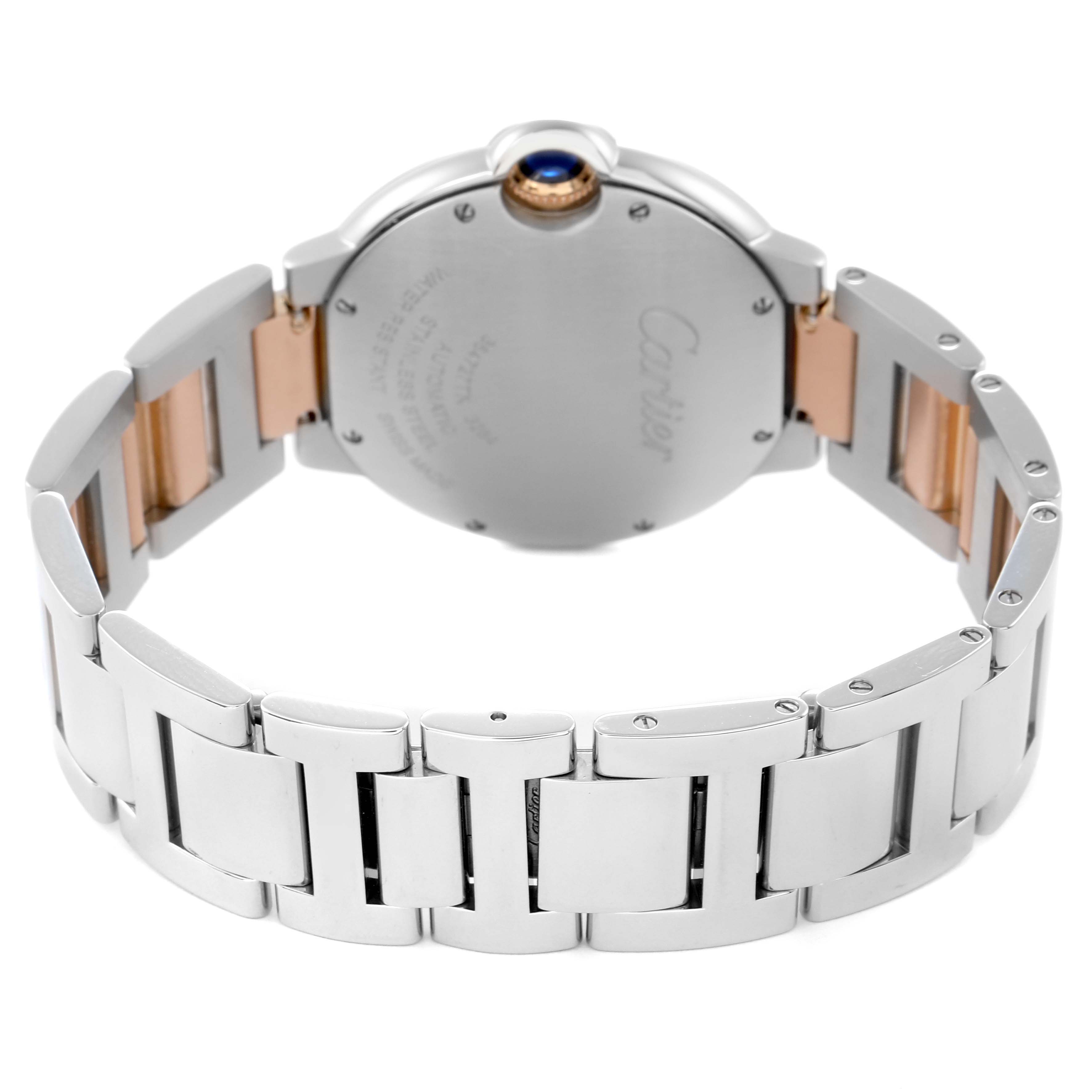 The image shows the back of the Cartier Ballon Bleu W3BB0018 Men
s Steel and Gold (two tone) Silver Dial W3BB0018 Men
s Steel and Gold (two tone) Silver Dial watch and part of its metal strap in a rear angle view.