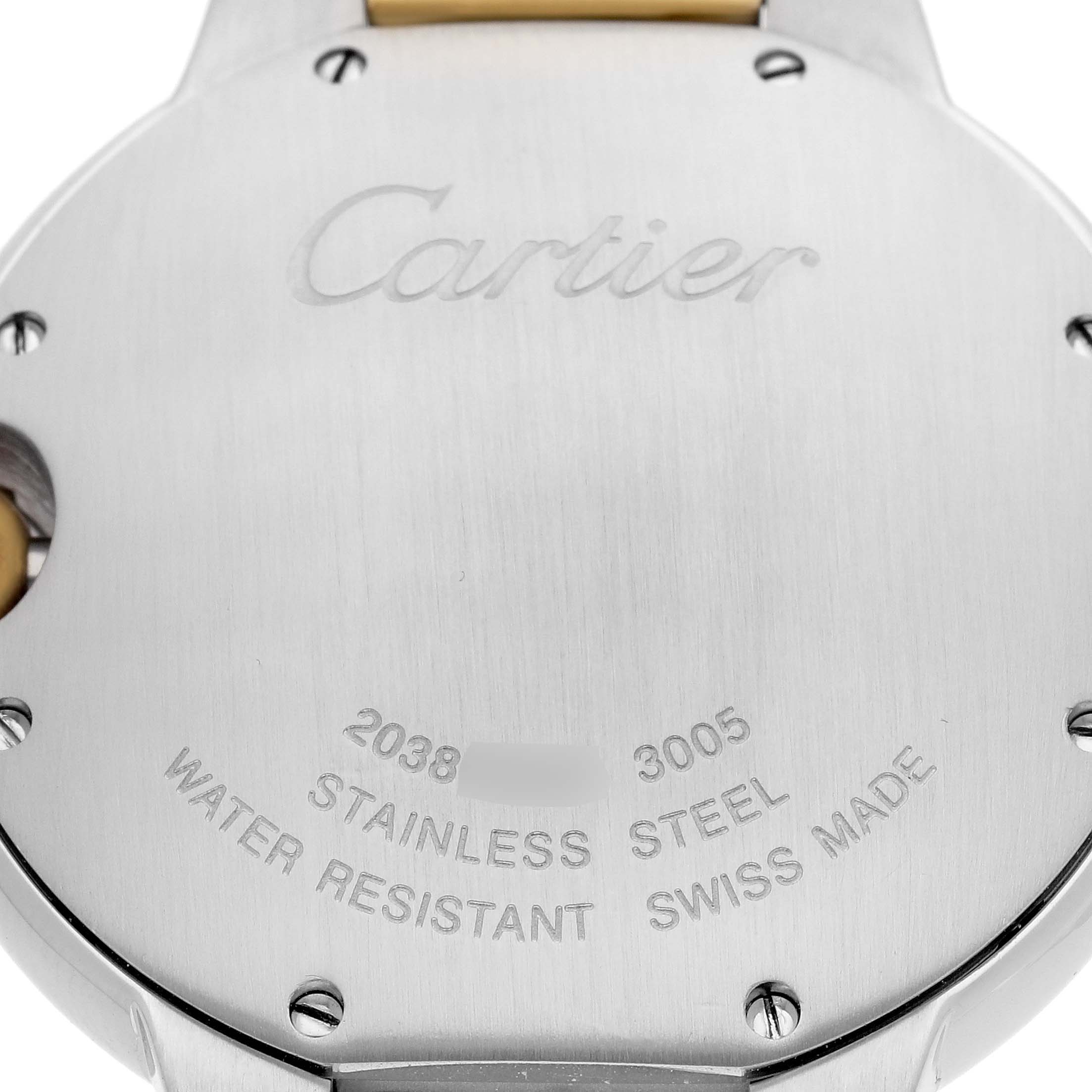 The image shows the back casing of a Cartier Ballon Bleu W69008Z3 Men
s Steel and Gold (two tone) Silver Dial W69008Z3 Men
s Steel and Gold (two tone) Silver Dial watch, highlighting the engraved brand name and specifications.
