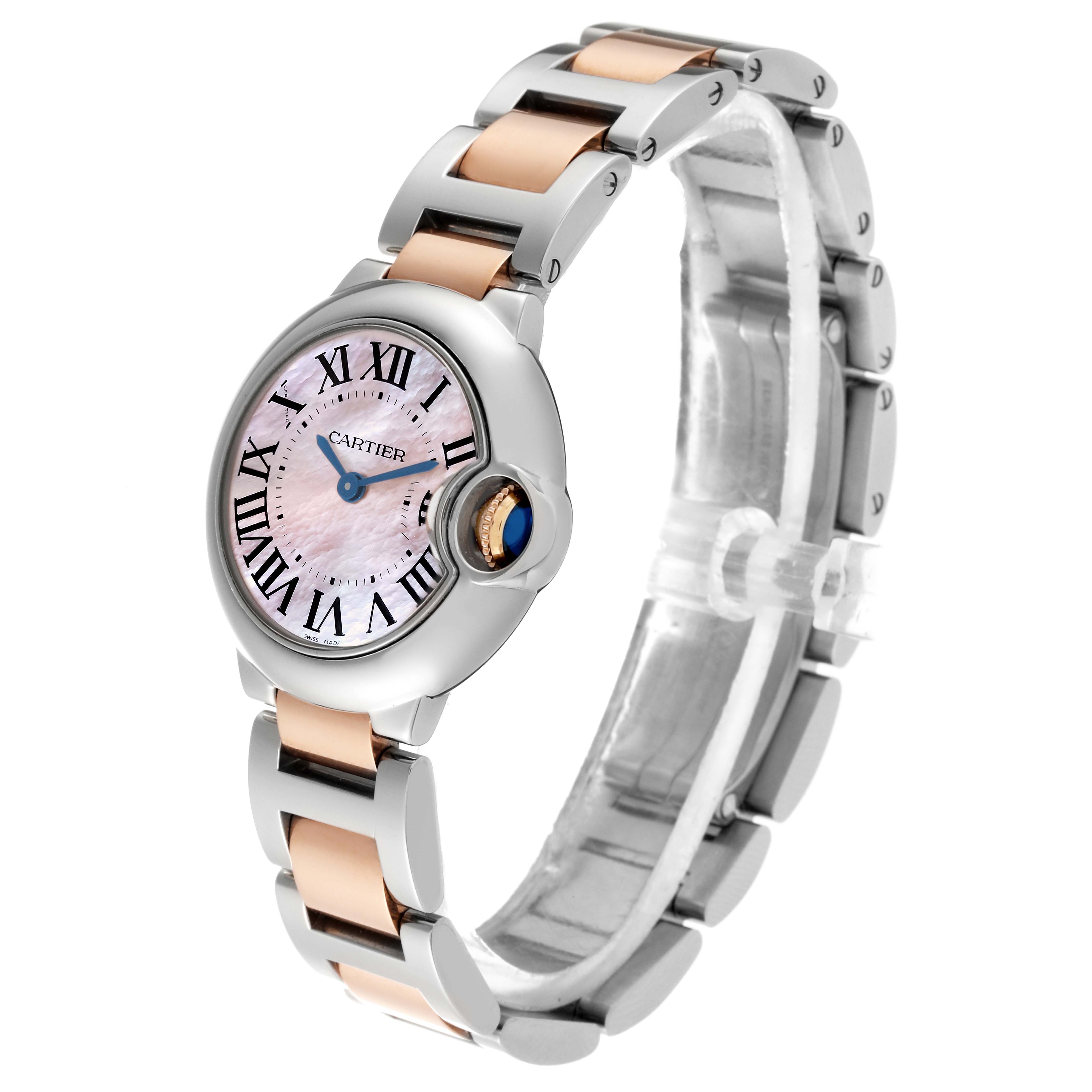 This Cartier Ballon Bleu W6920034 Women's Steel and Gold (two tone) Mother of Pearl Dial W6920034 Women's Steel and Gold (two tone) Mother of Pearl Dial model watch is shown from a front-left angle, highlighting its face, crown, and two-tone bracelet.