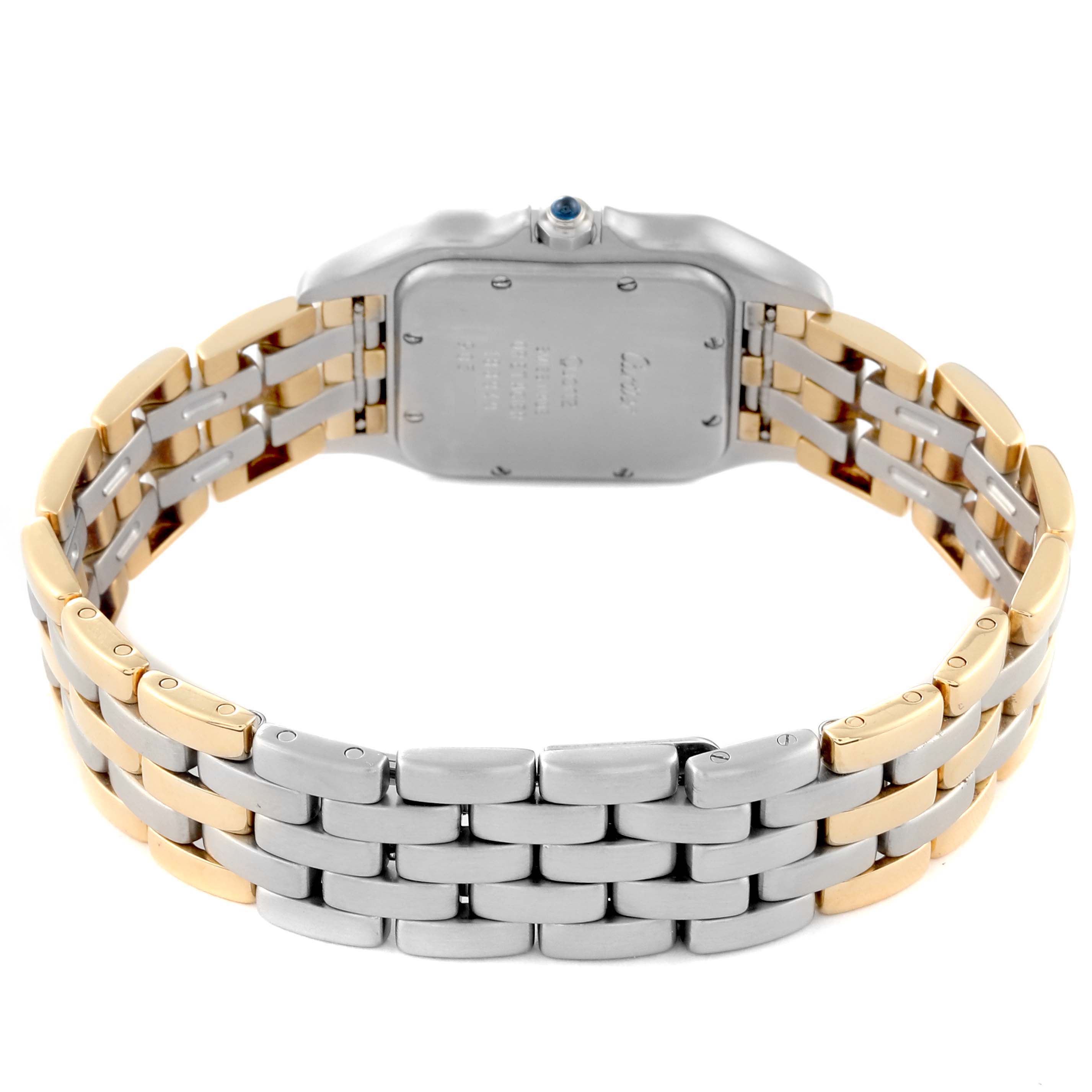 The image shows the back and bracelet of a Cartier Panthère watch, highlighting its two-tone metal design.