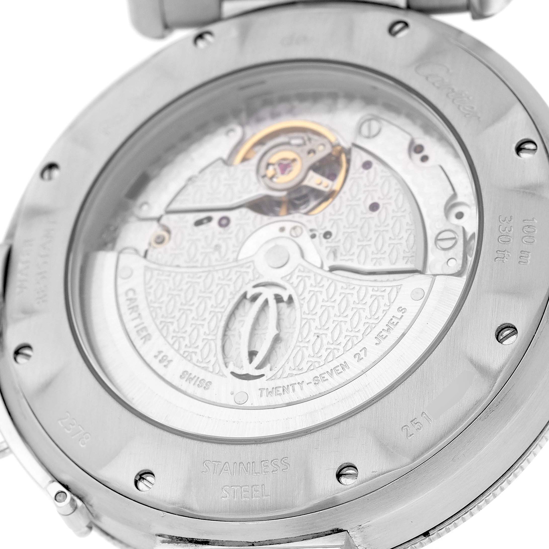 The image shows the back of the Cartier Pasha W31059H3 Men's Stainless Steel Silver Dial watch, highlighting its movement through a transparent case back.