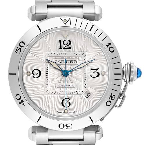 The image shows a Cartier Pasha W31059H3 Men's Stainless Steel Silver Dial watch face from a front angle, highlighting its dial, bezel, and crown with a blue cabochon.