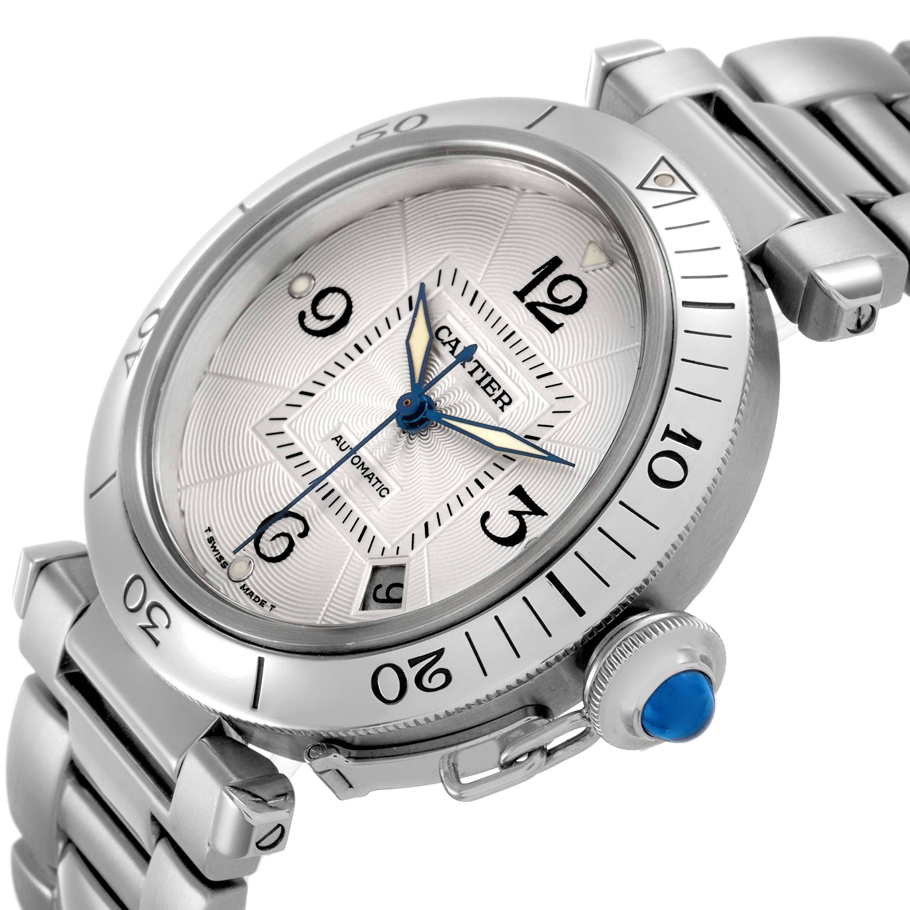The Cartier Pasha W31059H3 Men's Stainless Steel Silver Dial watch is shown at an angle highlighting the dial, bezel, crown, and part of the metal bracelet.