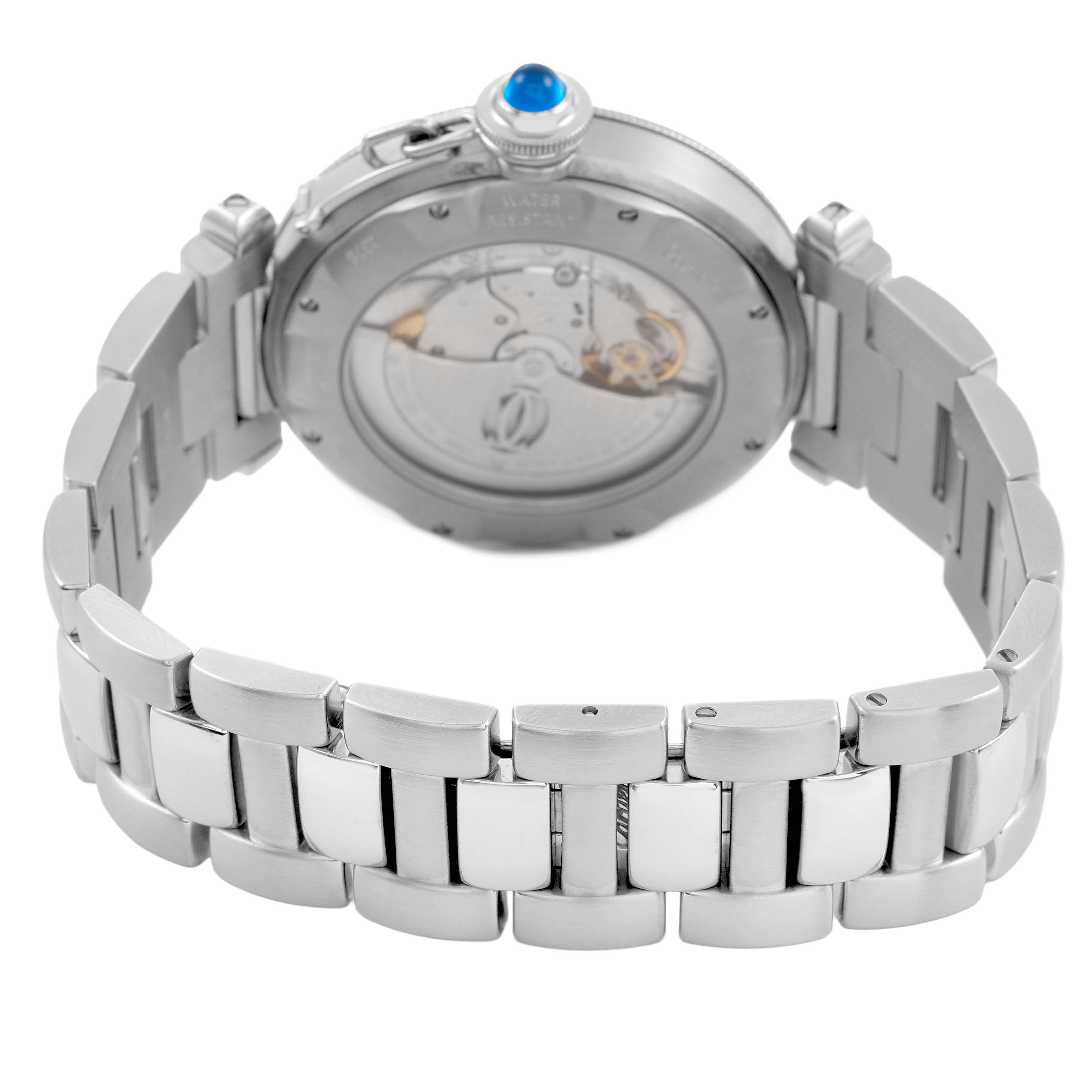 The image shows the back view of a Cartier Pasha W31059H3 Men's Stainless Steel Silver Dial watch, highlighting the bracelet and case back with visible movement.