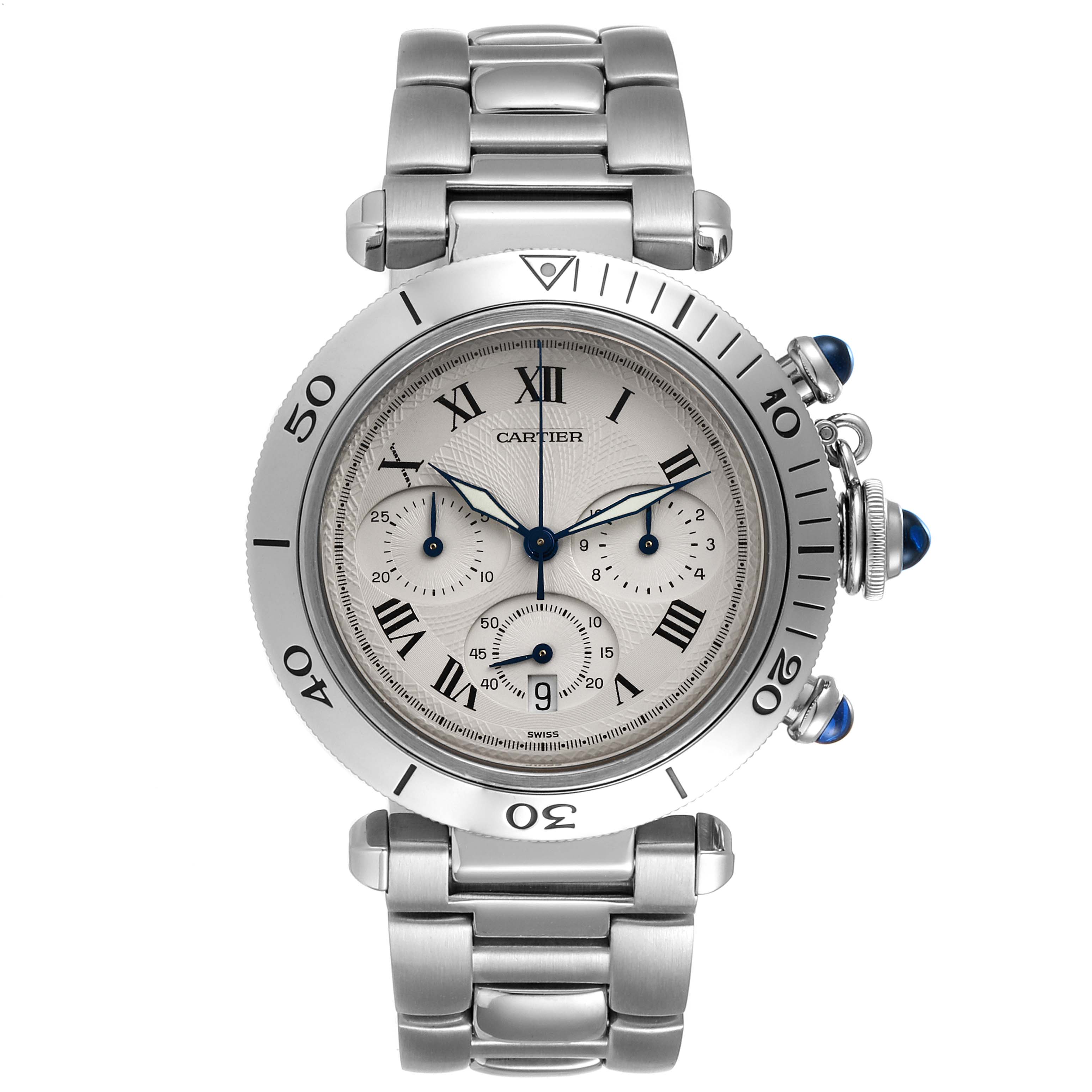 The image shows a frontal view of a Cartier Pasha W31018H3 Men
s Stainless Steel Silver Dial W31018H3 Men
s Stainless Steel Silver Dial watch displaying its face, bracelet, and crown with blue cabochon.