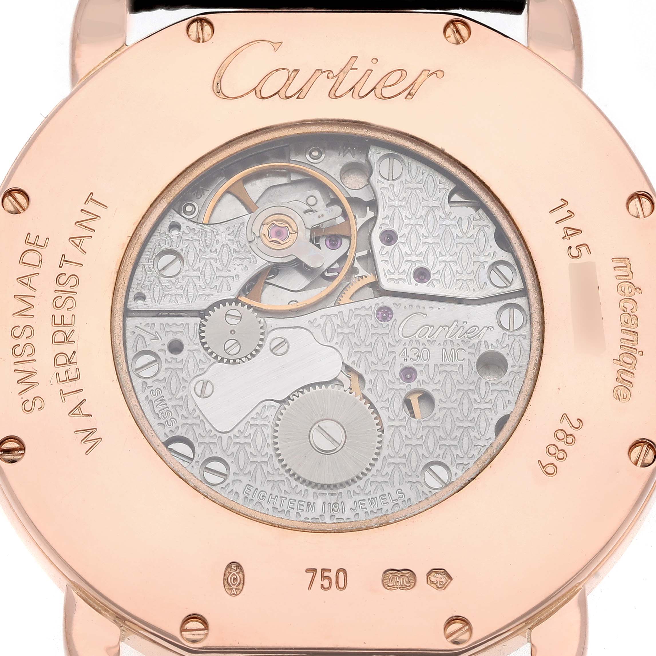 The image shows the back of a Cartier Ronde W6800251 Men
s Rose Gold Silver Dial W6800251 Men
s Rose Gold Silver Dial watch, revealing its mechanical movement and metal casing.