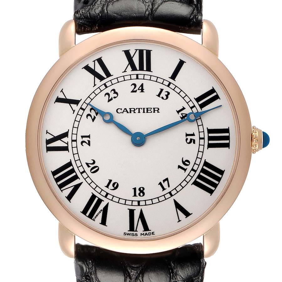 The Cartier Ronde watch is shown from the front, highlighting the dial, Roman numerals, and blue hands.