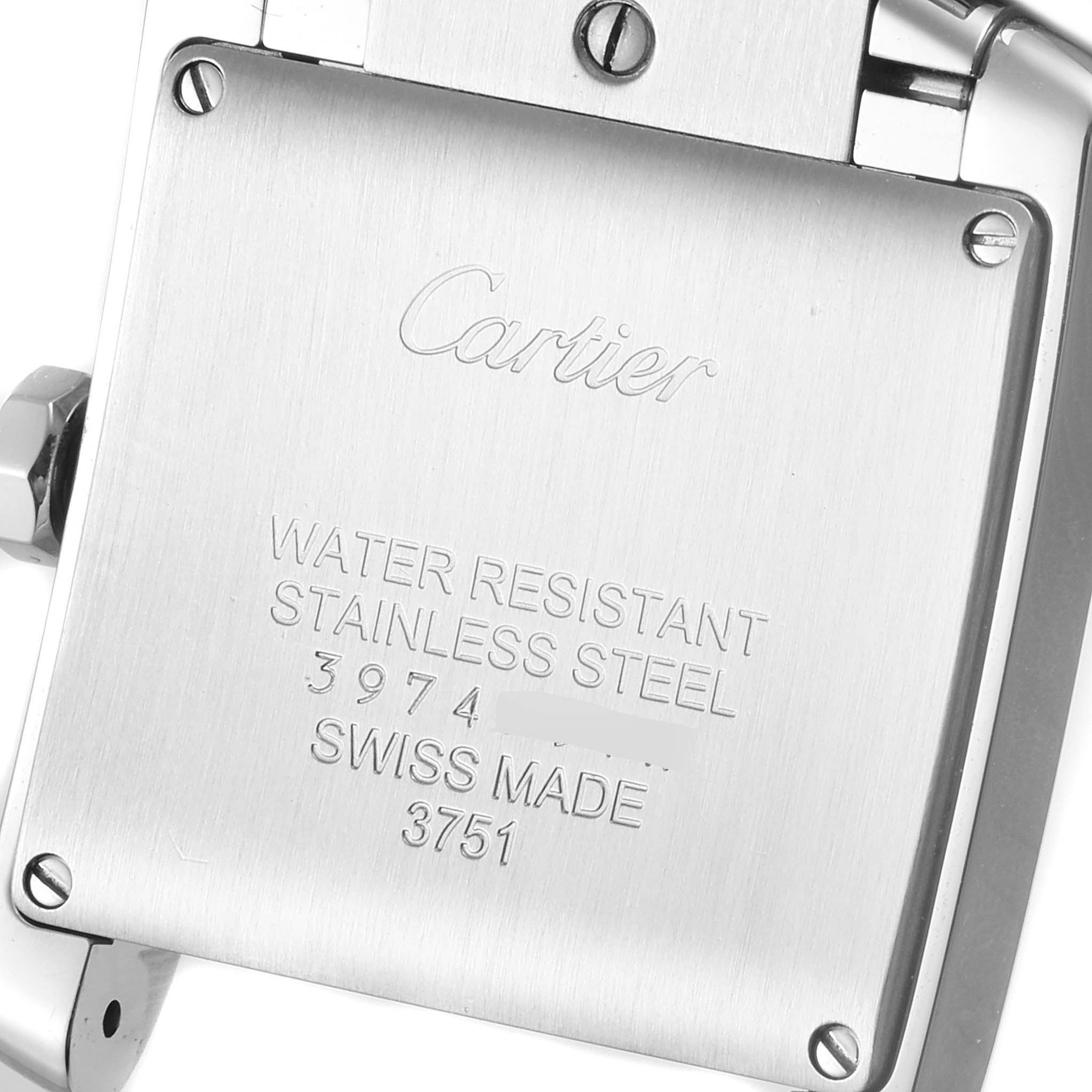 The image shows the back case of a Cartier Tank Francaise W4TA0009 Women's Stainless Steel Silver Dial W4TA0009 Women's Stainless Steel Silver Dial watch, highlighting its stainless steel material and water resistance.