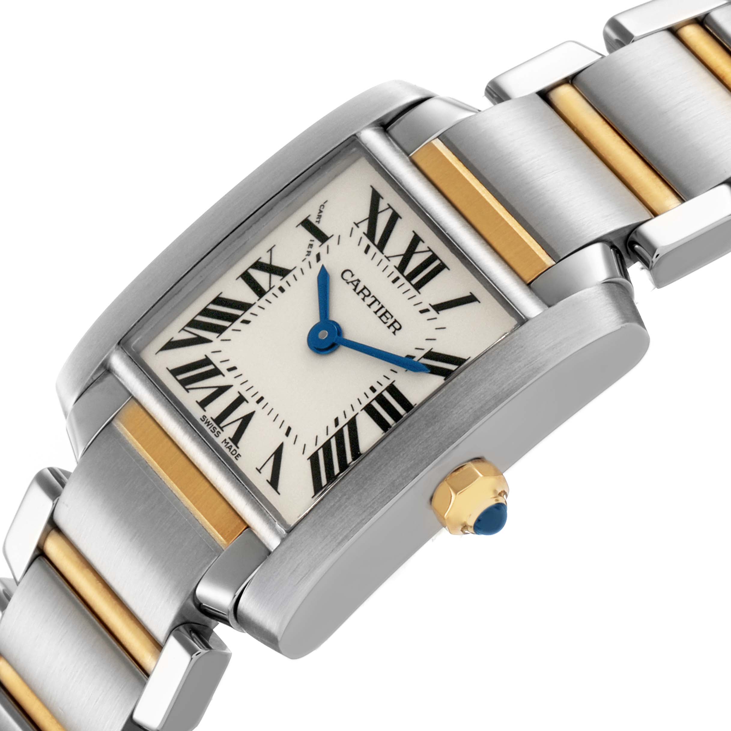 The Cartier Tank Française watch is shown at an angle highlighting the dial, Roman numerals, blue hands, and part of the bracelet.