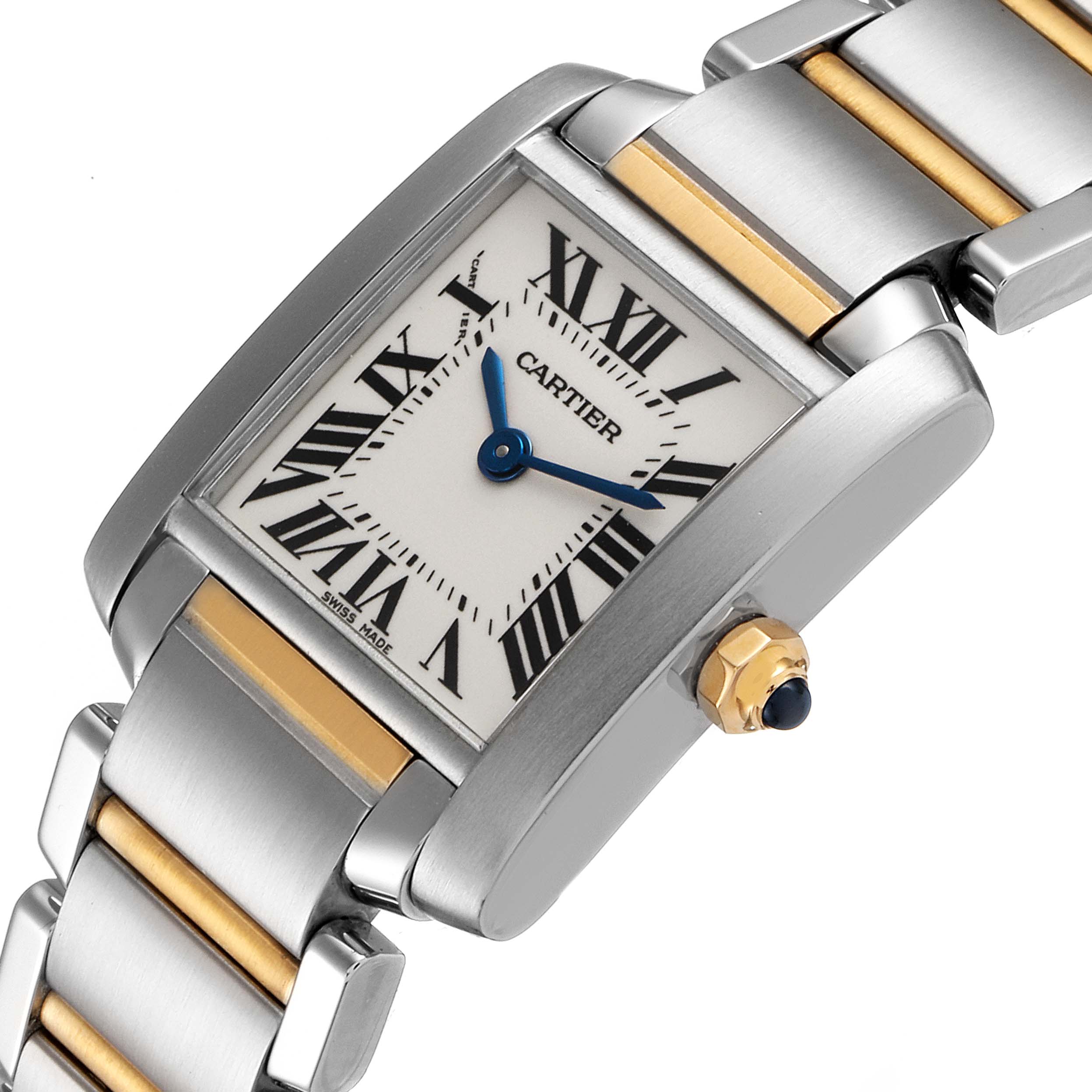 The image shows a close-up of a Cartier Tank Francaise W51007Q4 Women's Steel and Gold (two tone) Silver Dial W51007Q4 Women's Steel and Gold (two tone) Silver Dial watch face, crown, and part of the metal bracelet.