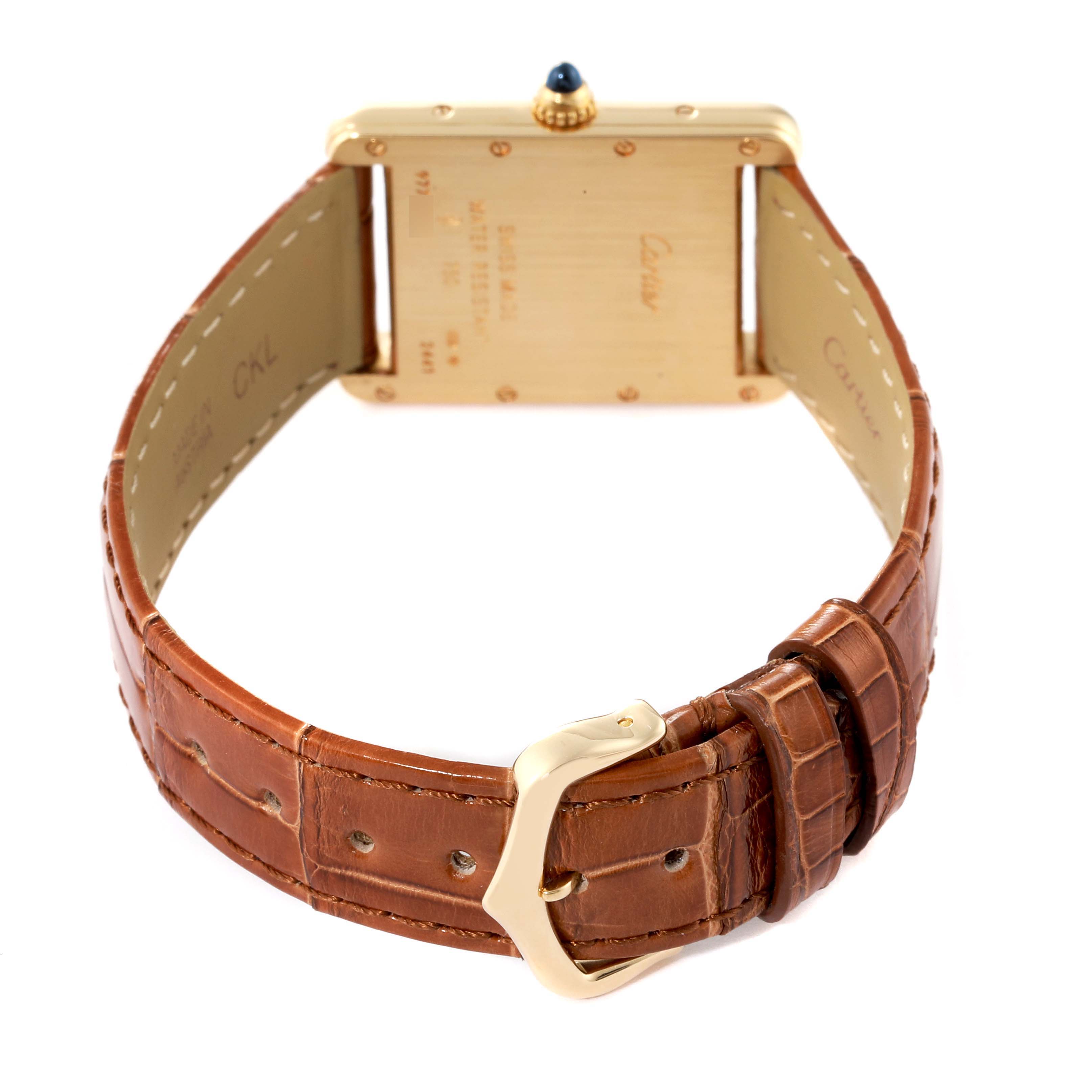 This image shows the back and strap of the Cartier Tank Louis W1529756 Men's Yellow Gold Silver Dial W1529756 Men's Yellow Gold Silver Dial watch, highlighting the brown leather band and gold buckle.