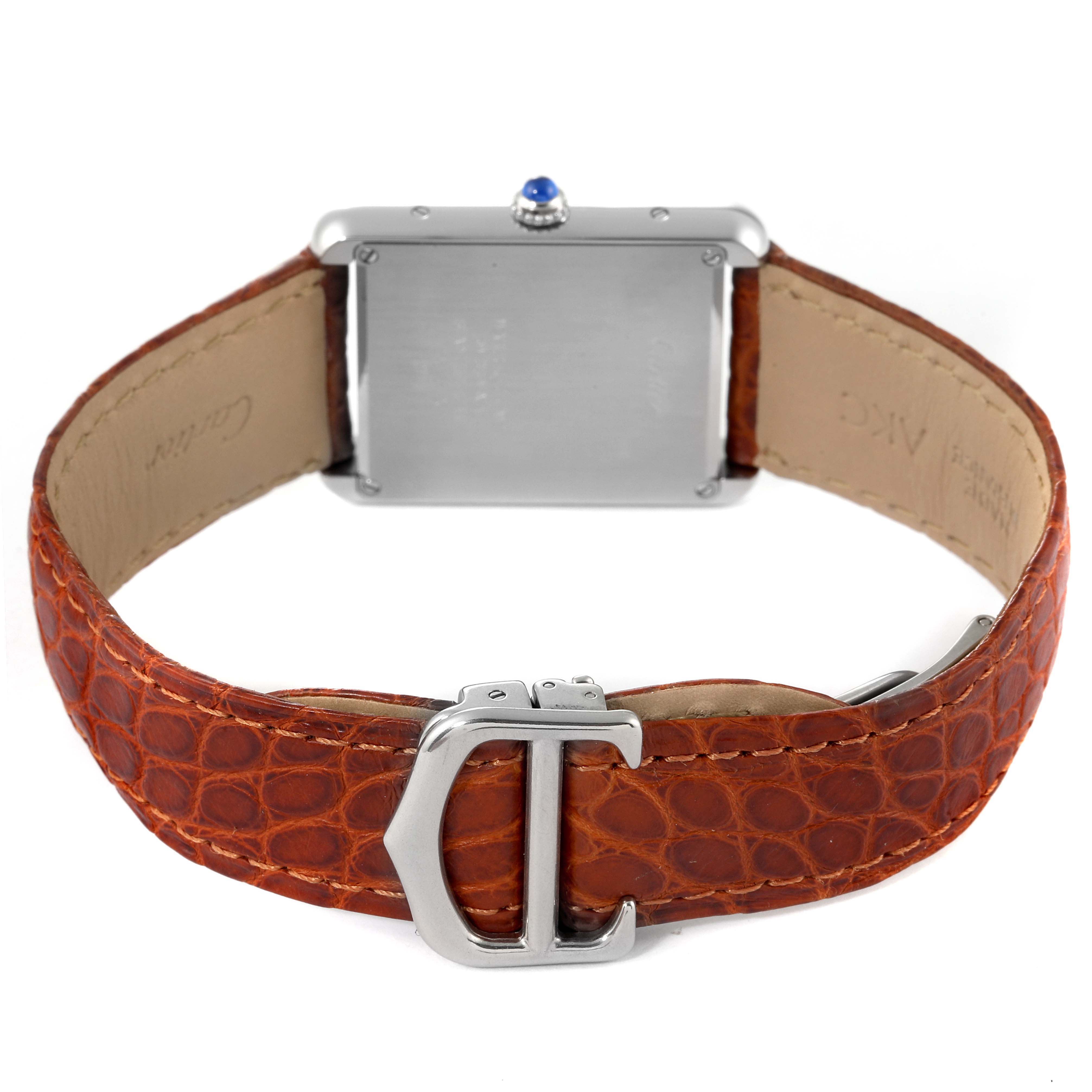 This image shows the Tank Solo model by Cartier from the back, focusing on the leather strap and buckle clasp.