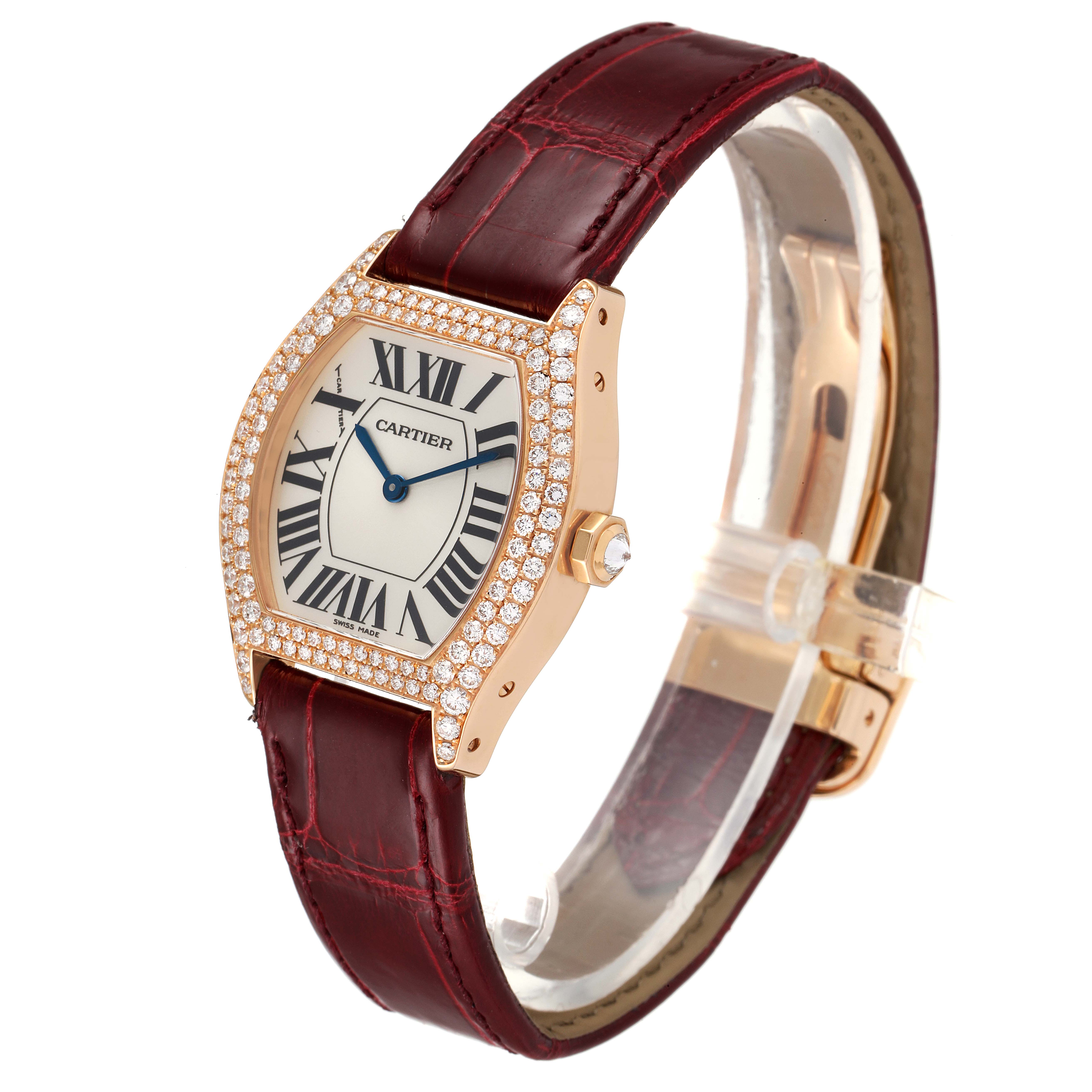 The image shows a Tortue model by Cartier at a slight angle, highlighting its diamond bezel and leather strap.