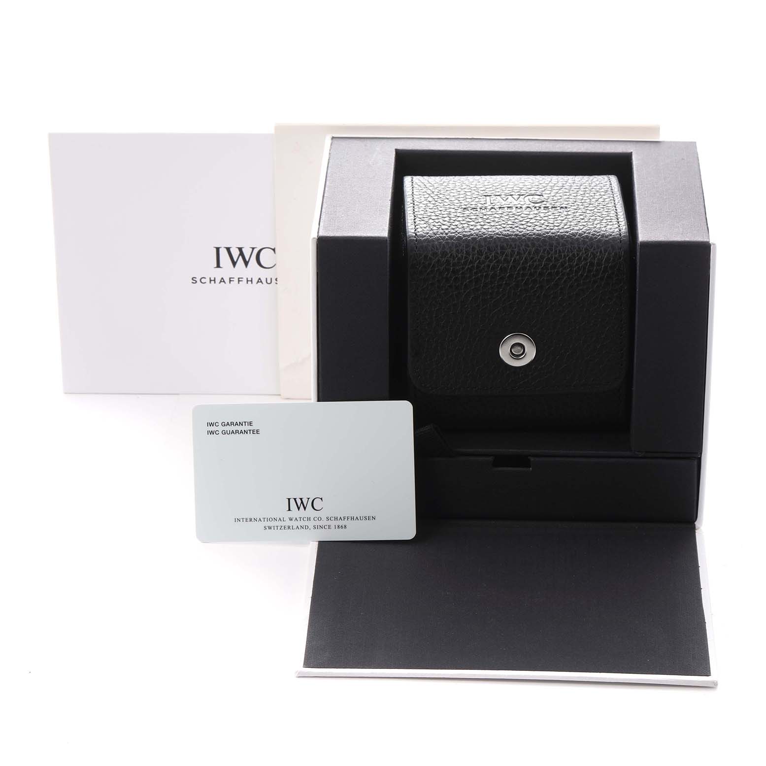 The IWC Pilot IW500901 Men
s Stainless Steel Black Dial IW500901 Men
s Stainless Steel Black Dial model accessories are shown from a frontal view and include a box, guarantee card, and case.