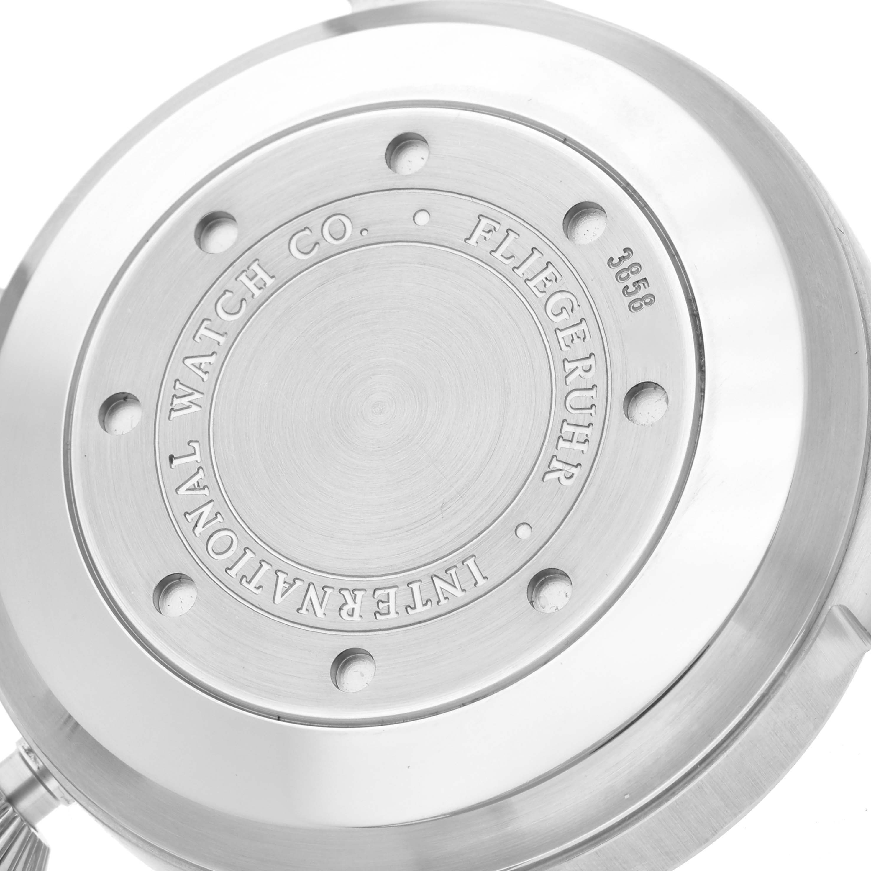 The image shows the case back of the IWC Pilot IW500901 Men
s Stainless Steel Black Dial IW500901 Men
s Stainless Steel Black Dial model watch, displaying engravings and screw details.