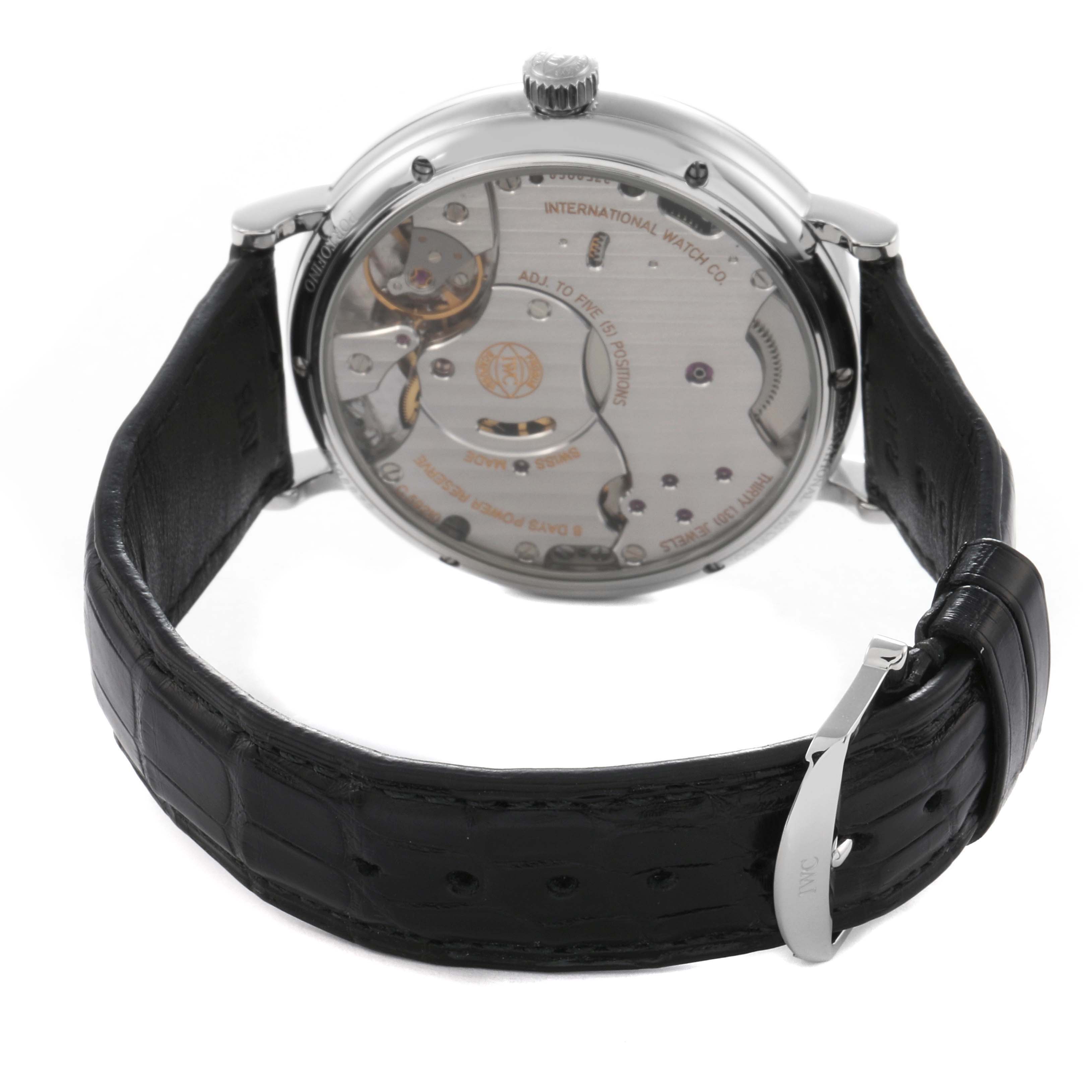 The IWC Portofino IW510102 Men
s Stainless Steel Black Dial IW510102 Men
s Stainless Steel Black Dial watch is shown from the back, highlighting the movement and leather strap.