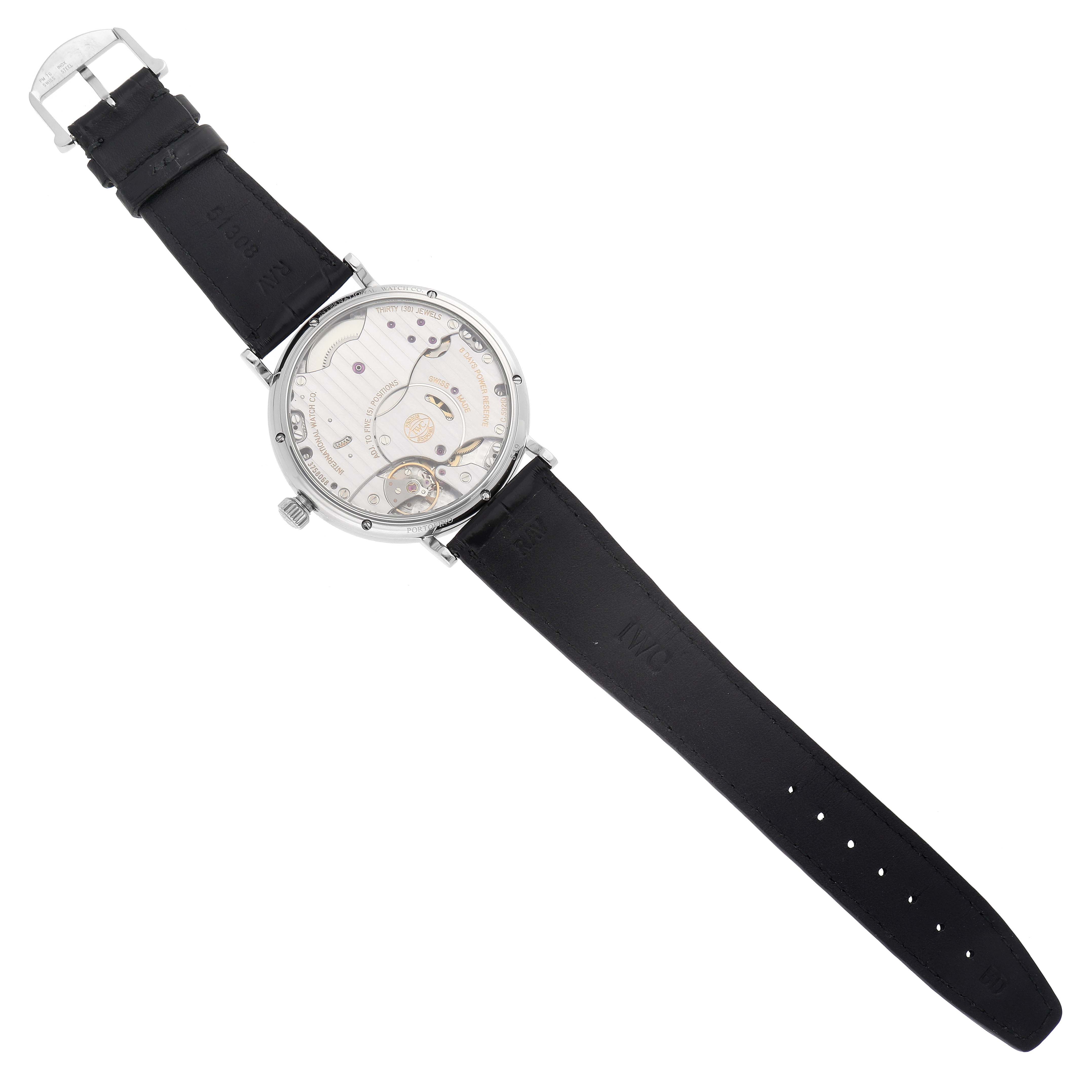 The image shows the back view of the IWC Portofino IW510102 Men
s Stainless Steel Black Dial IW510102 Men
s Stainless Steel Black Dial watch, highlighting its transparent case back and movement details.