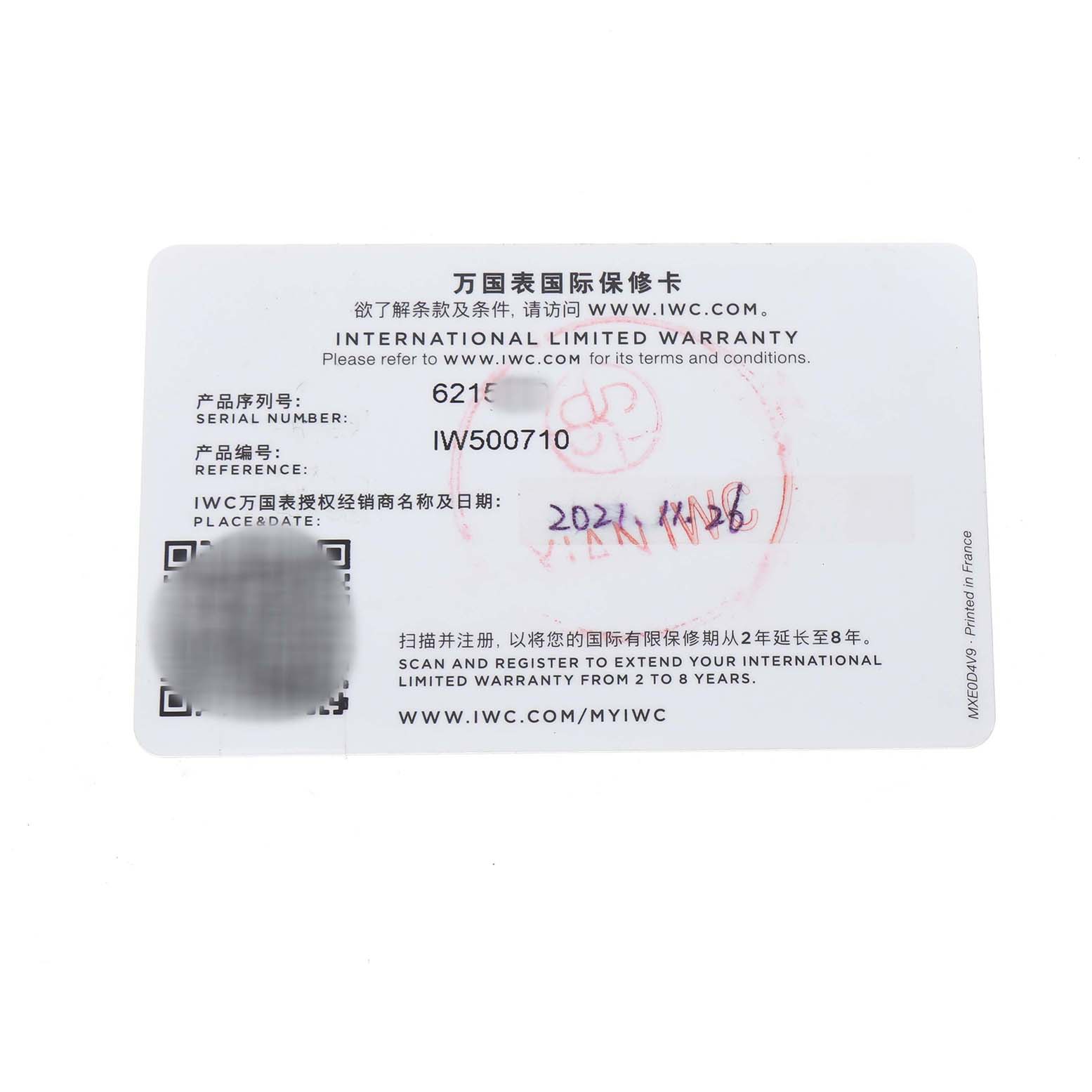 This image shows an International Limited Warranty card for the IWC Portuguese IW500710 Men's Stainless Steel Blue Dial model, with serial and reference numbers visible.