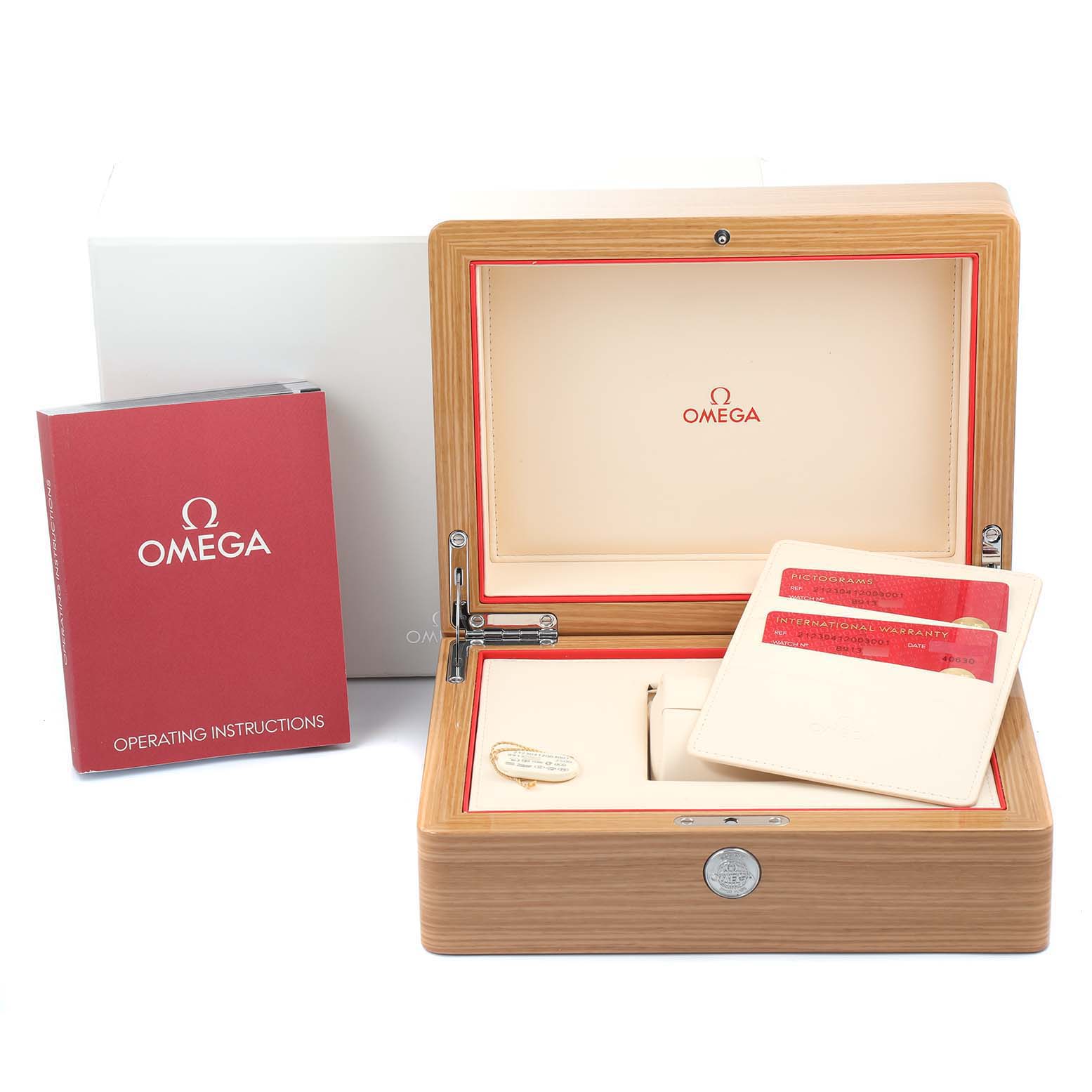 The image shows an Omega Seamaster 212.30.41.20.03.001 Men's Stainless Steel Blue Dial 212.30.41.20.03.001 Men's Stainless Steel Blue Dial model watch box, a red operating instructions booklet, and warranty cards at an angled open view.