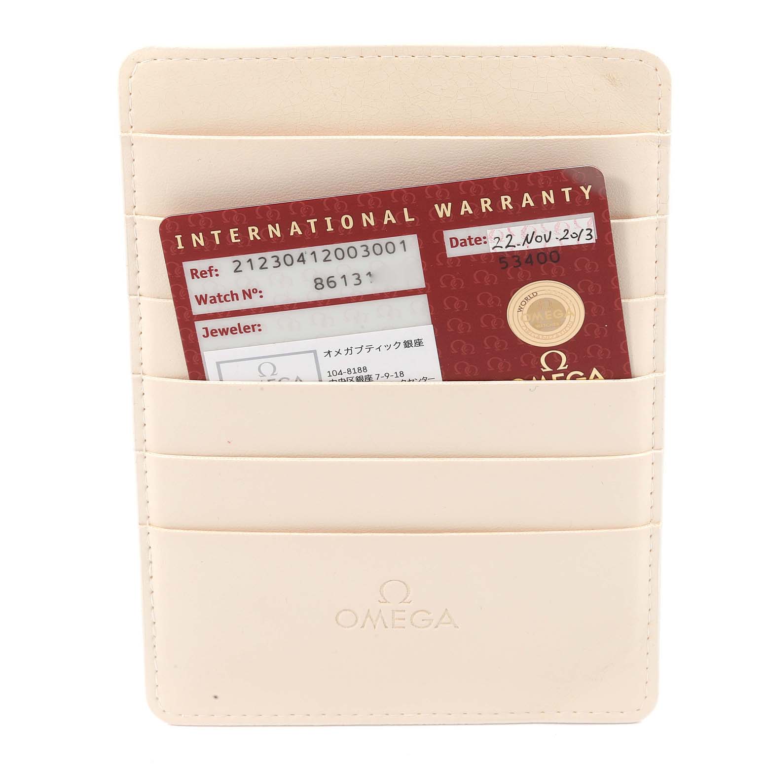 The image shows the international warranty card for the Omega Seamaster 212.30.41.20.03.001 Men's Stainless Steel Blue Dial 212.30.41.20.03.001 Men's Stainless Steel Blue Dial model, held in a beige Omega cardholder.