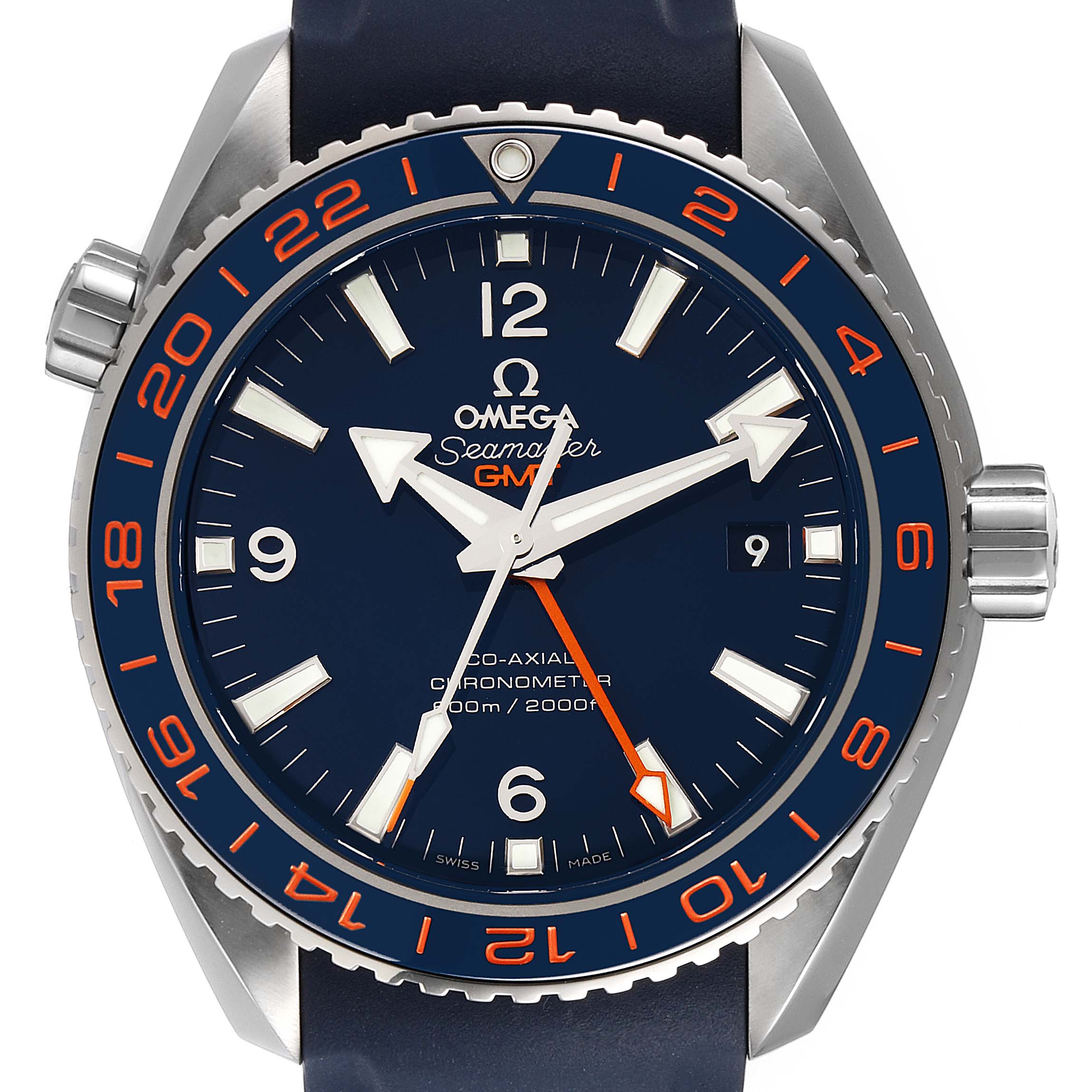 The image shows a front view of an Omega Seamaster Planet Ocean GMT watch, highlighting the dial, bezel, hands, and part of the strap.