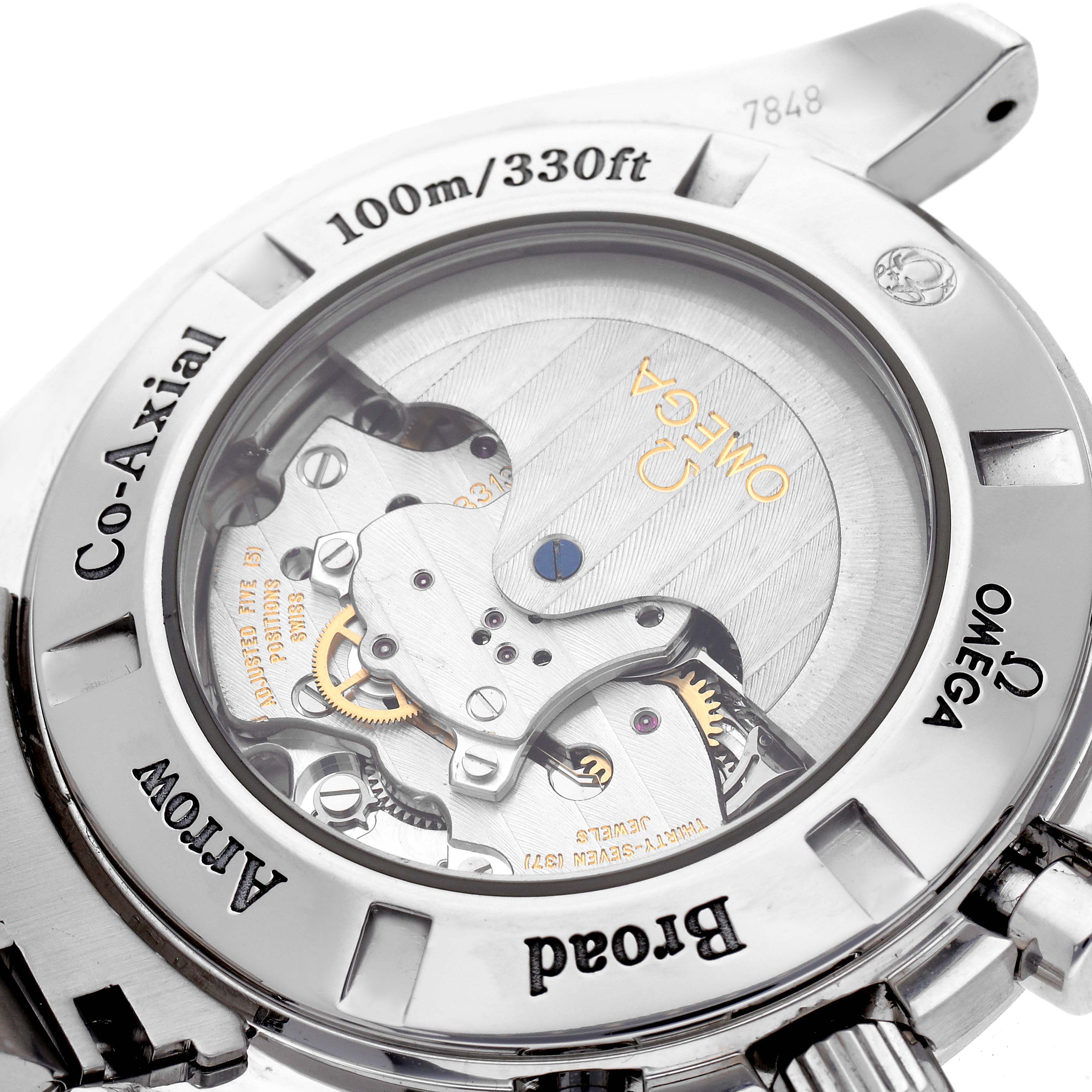 The image shows the exposed movement and case back of an Omega Speedmaster 321.10.44.50.01.001 Men's Stainless Steel Black Dial 321.10.44.50.01.001 Men's Stainless Steel Black Dial, featuring its mechanical components and branding.