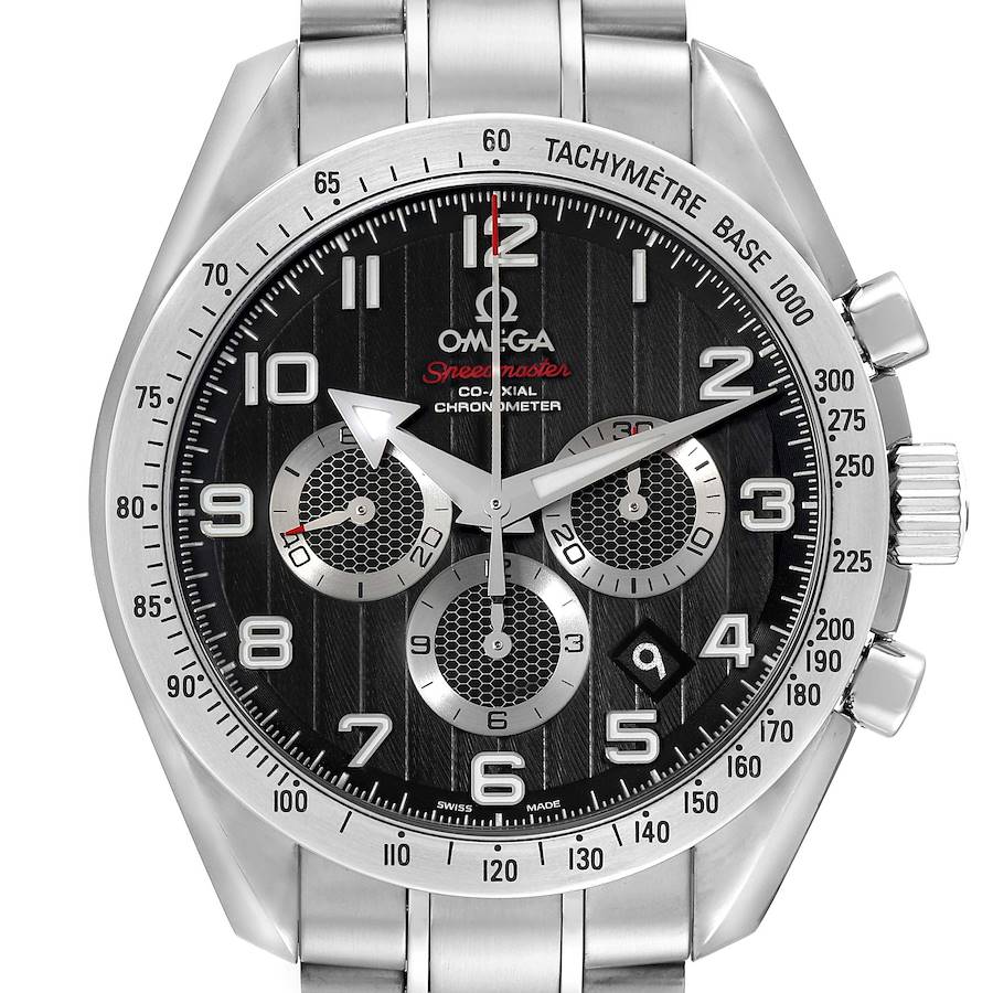 The Omega Speedmaster watch is shown from a front angle, highlighting its face, bezel, and metal bracelet.