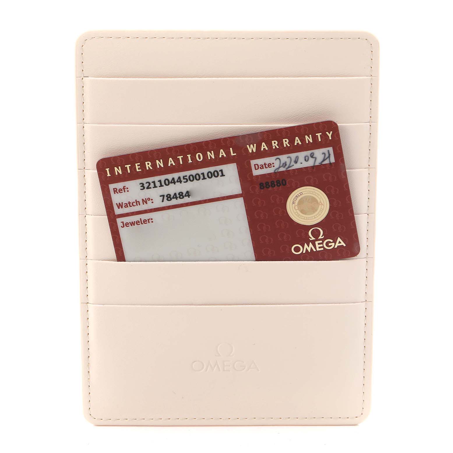 The image shows an Omega Speedmaster 321.10.44.50.01.001 Men's Stainless Steel Black Dial 321.10.44.50.01.001 Men's Stainless Steel Black Dial warranty card inside a light-colored cardholder, viewed from the front.