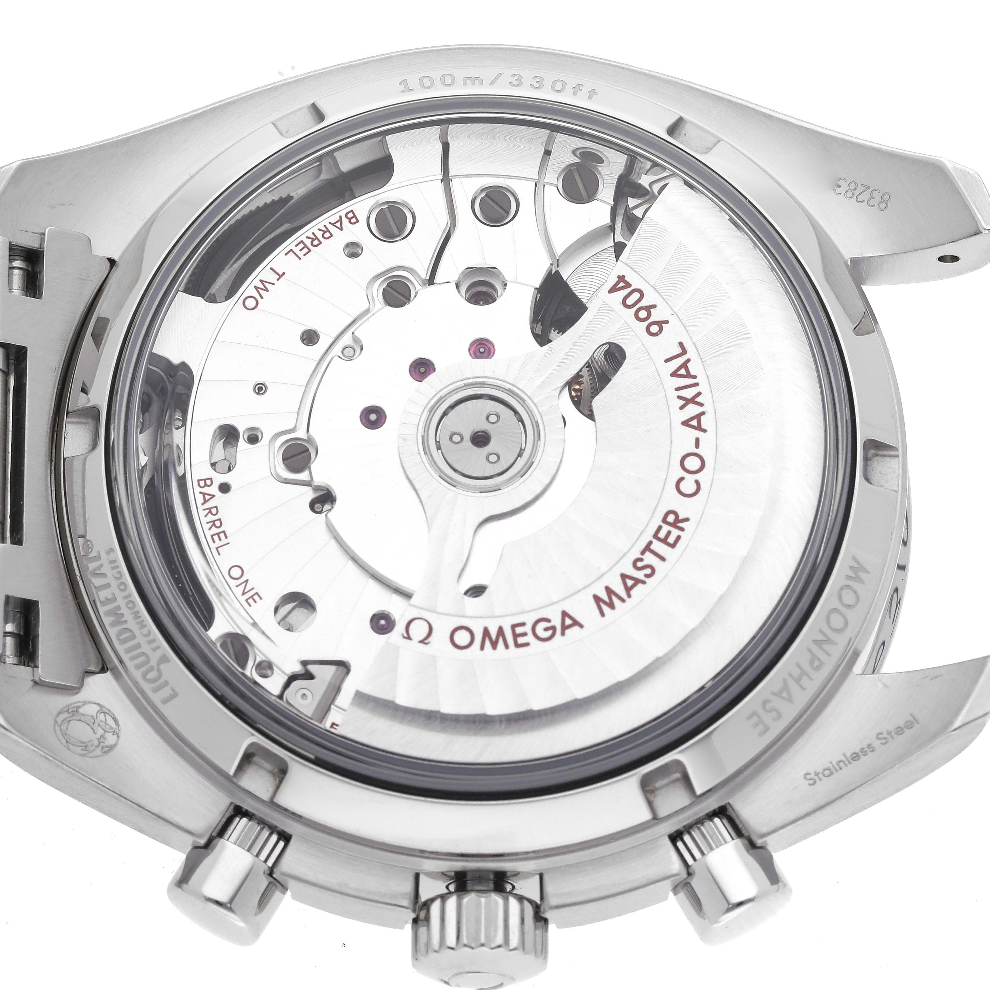 The image shows the back view of an Omega Speedmaster 304.30.44.52.01.001 Men
s Stainless Steel Black Dial 304.30.44.52.01.001 Men
s Stainless Steel Black Dial, highlighting the movement and internal mechanisms through the transparent case back.