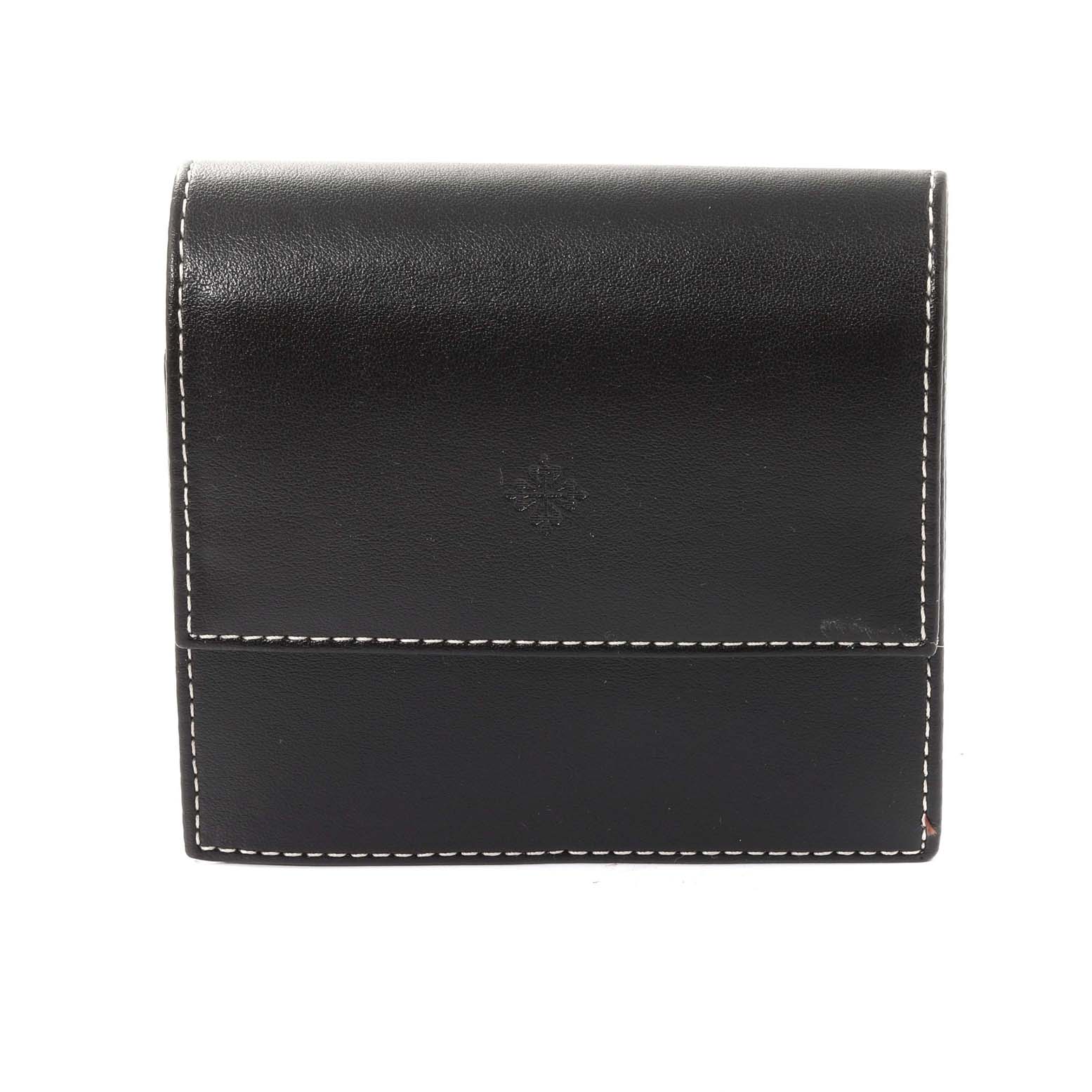 This is a front view of the black leather pouch for the Calatrava model from Patek Philippe.