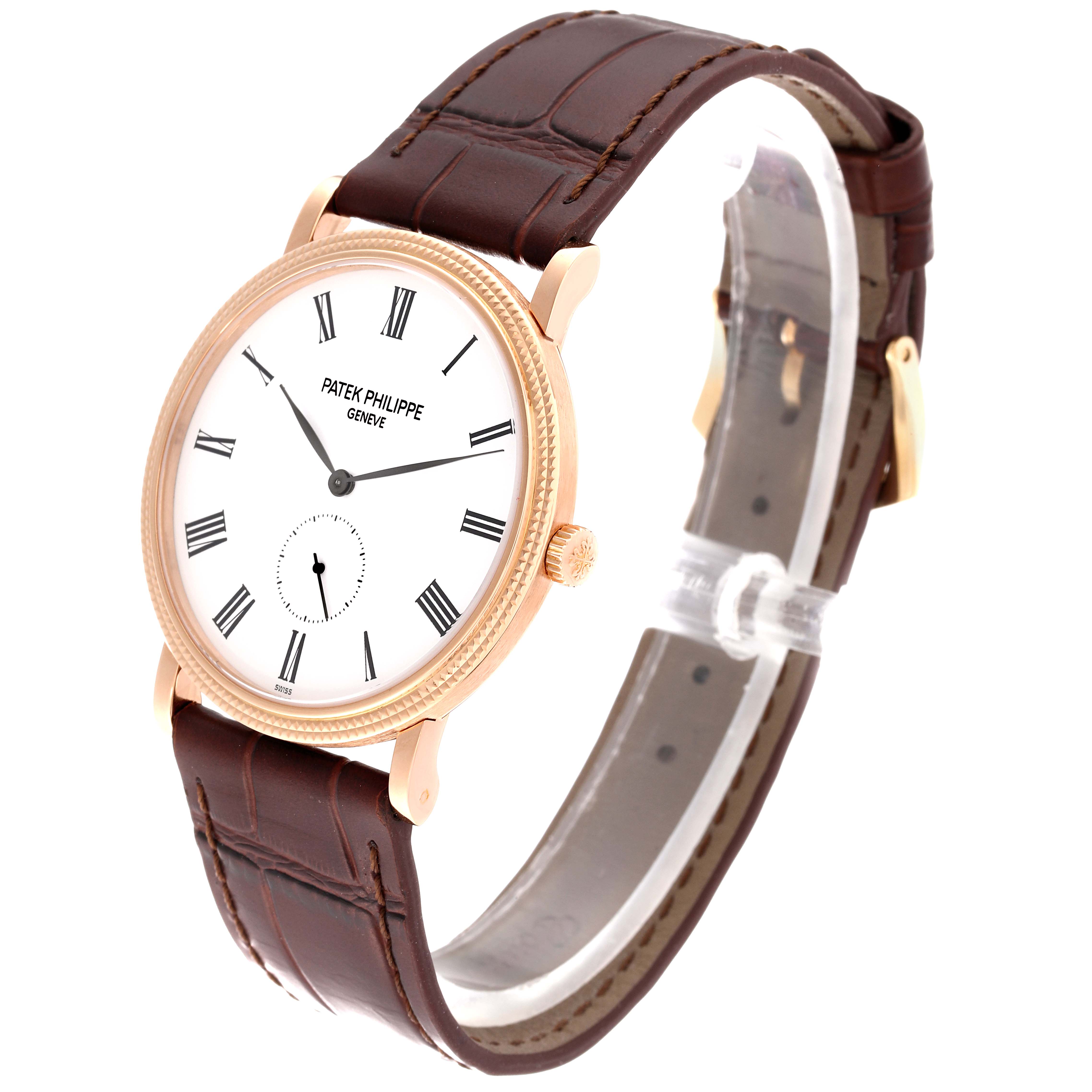 The image shows a Patek Philippe Calatrava 5119R Men's Rose Gold White Dial 5119R Men's Rose Gold White Dial watch at a three-quarter angle featuring its dial, crown, and leather strap.