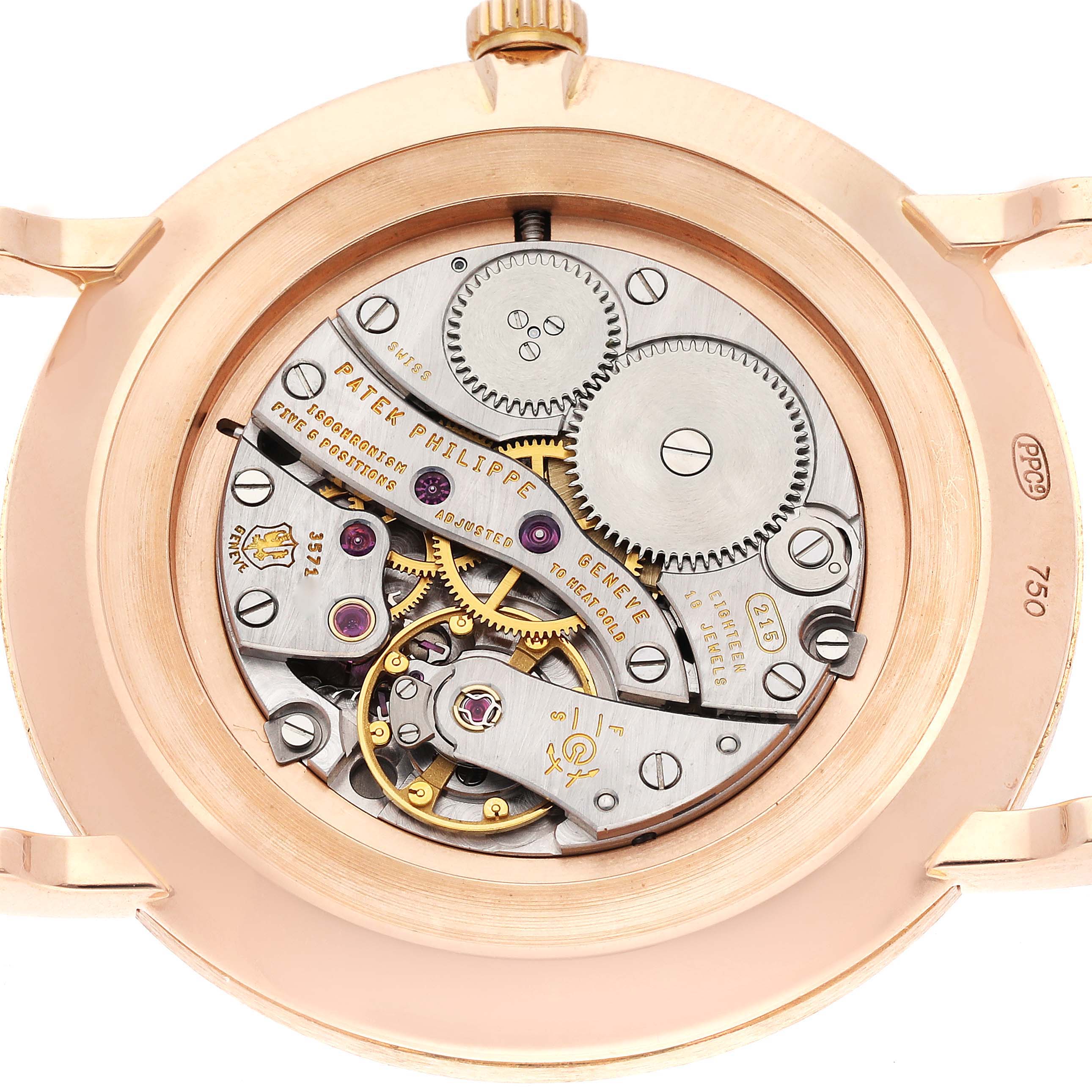 The image shows the back view of a Patek Philippe Calatrava 5119R Men's Rose Gold White Dial 5119R Men's Rose Gold White Dial watch, revealing its intricate movement mechanics.