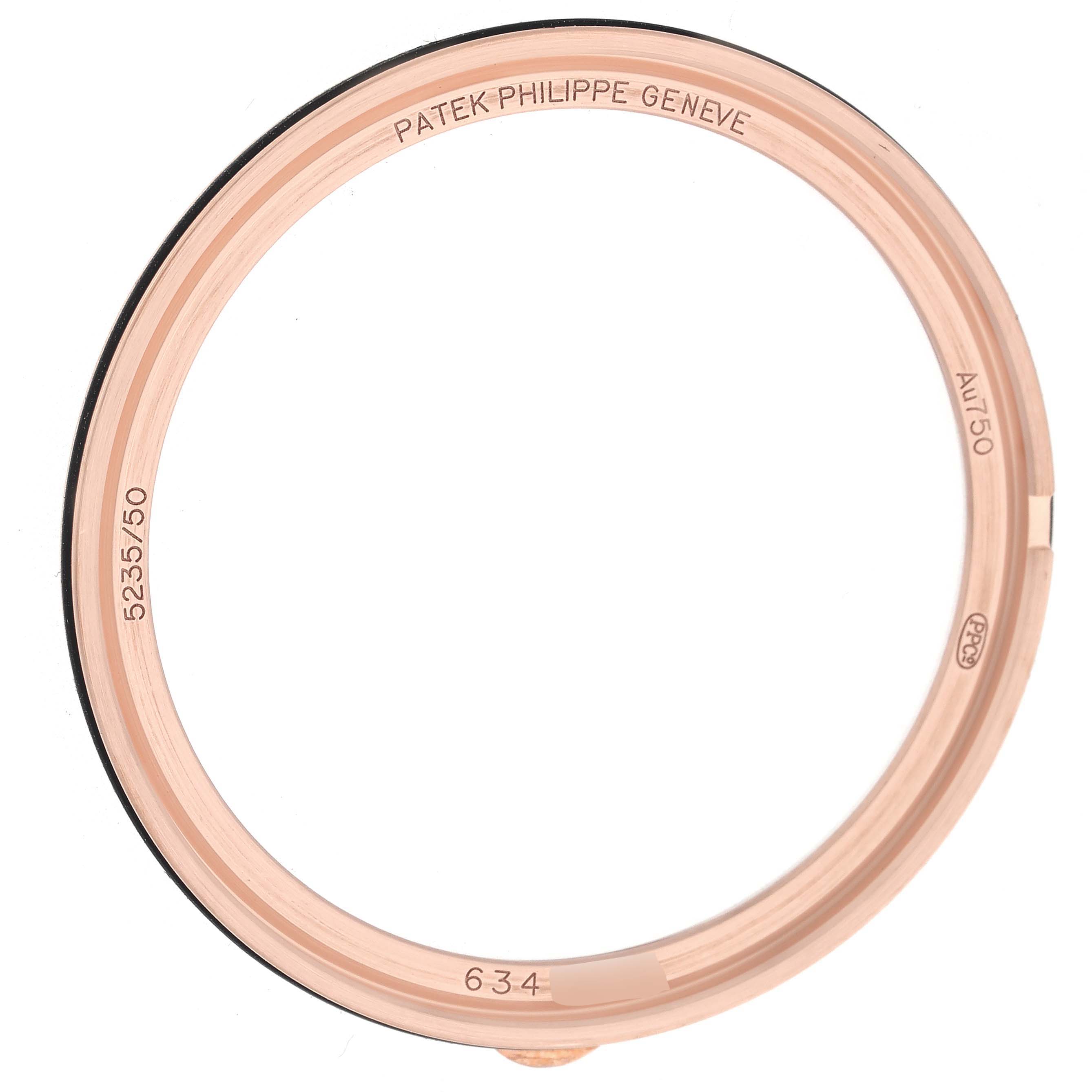 The image shows the case bezel of a Patek Philippe Complications 5235/50R-001 Men
s Rose Gold Black Dial 5235/50R-001 Men
s Rose Gold Black Dial watch from a top view.