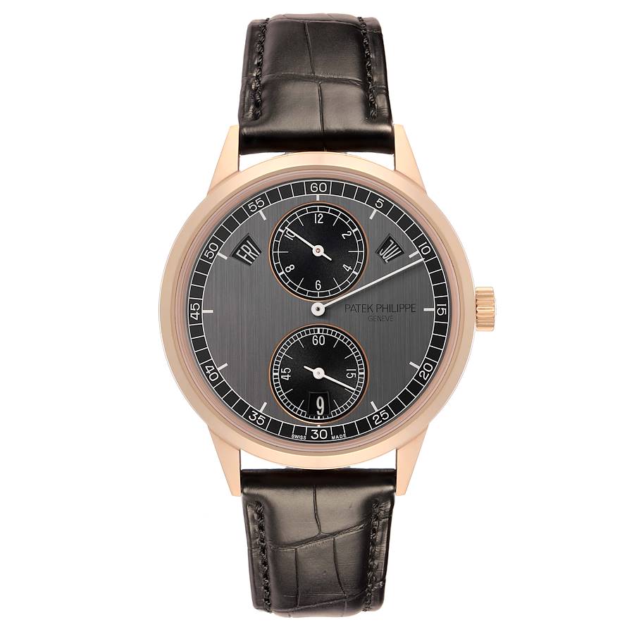 The Patek Philippe Complications watch is shown from a top-down angle, displaying its face, crown, and leather strap.