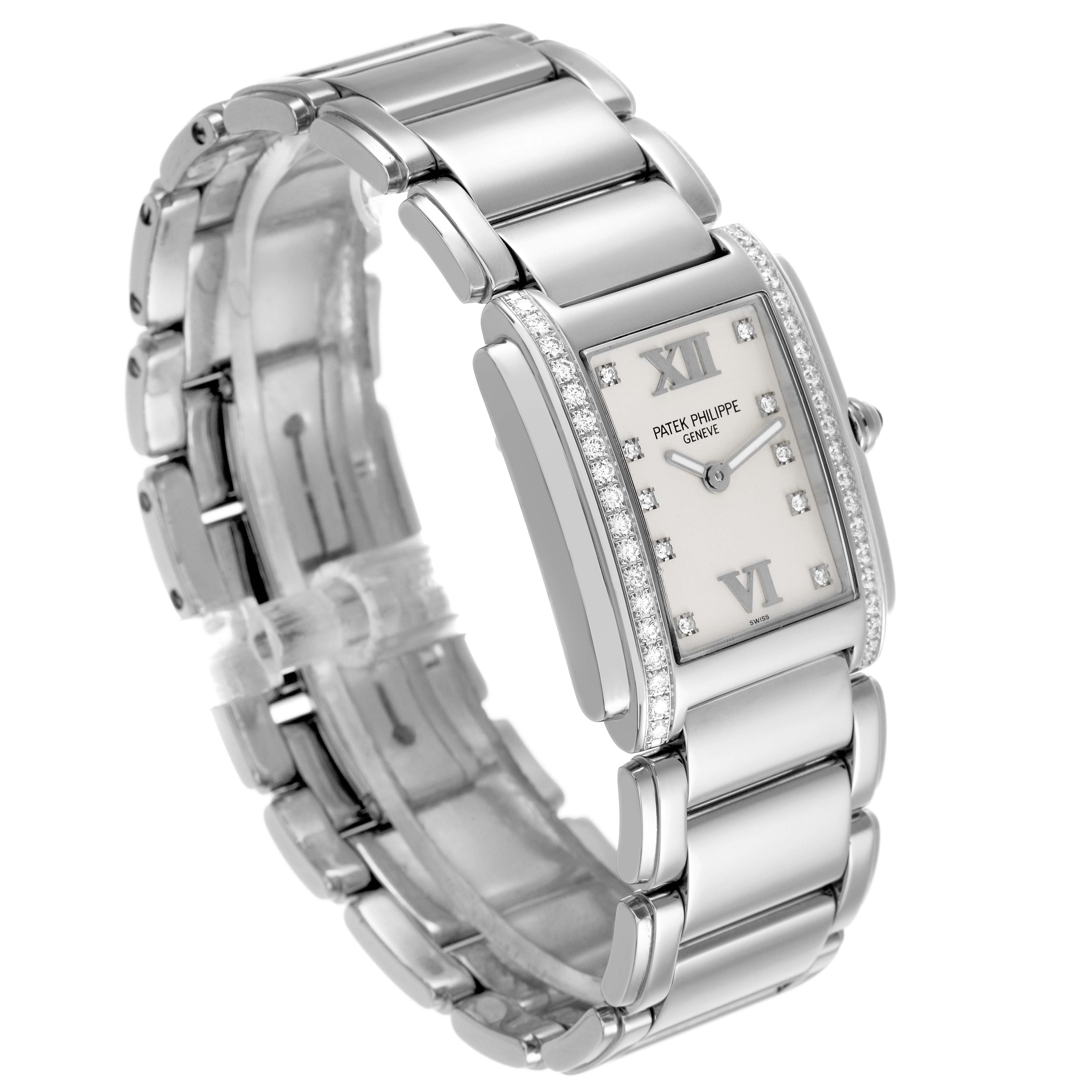 The Patek Philippe Twenty-4 4910/10A-011 Women's Stainless Steel Silver Dial watch is shown at a three-quarter angle, highlighting the dial, bezel, and bracelet.