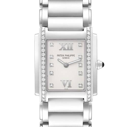 The Patek Philippe Twenty-4 4910/10A-011 Women's Stainless Steel Silver Dial watch is shown from a top-down angle, highlighting the face, bracelet, bezel, and crown details.