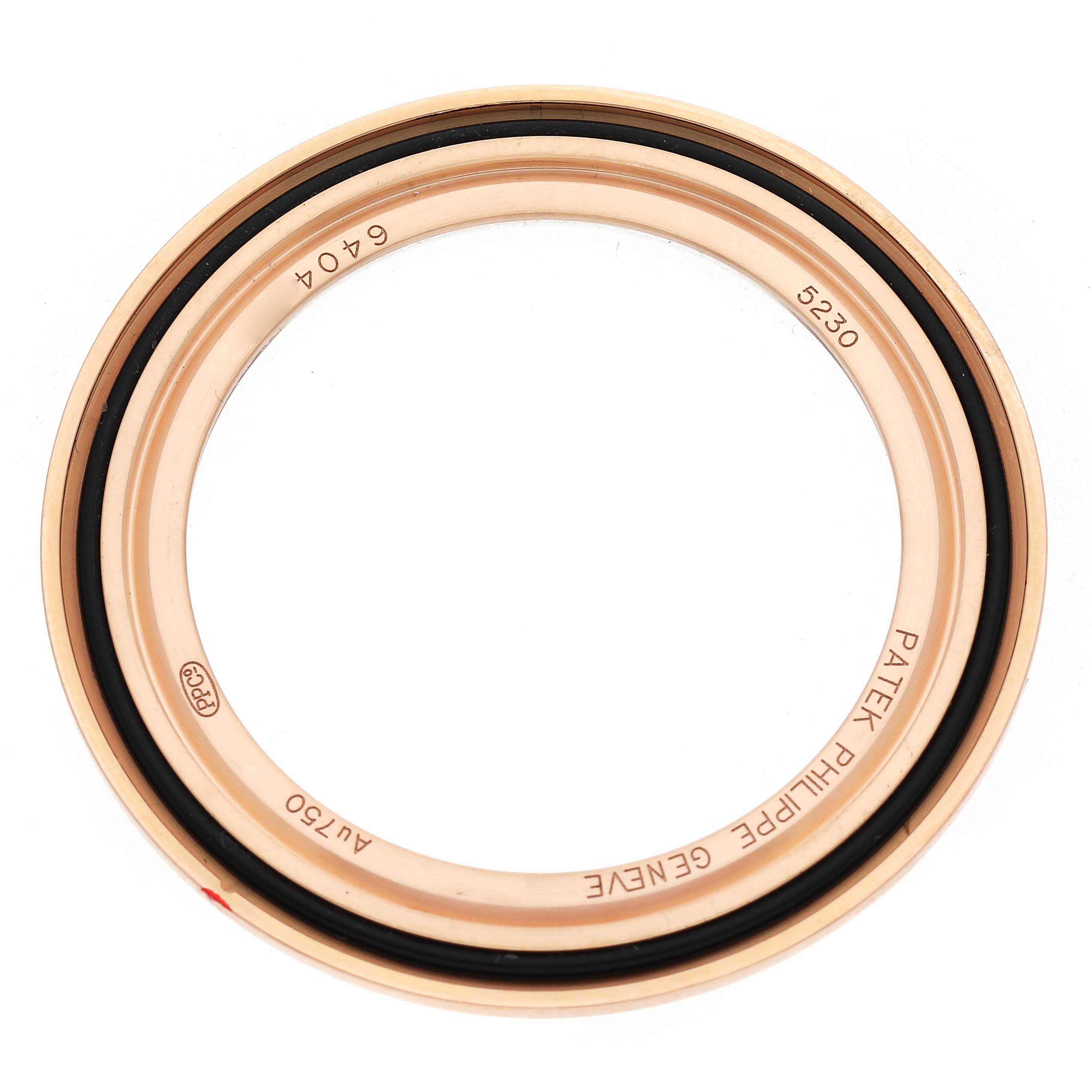 The image shows a rose gold bezel or ring viewed from above for a Patek Philippe Complications 5230R-001 Men
s Rose Gold Grey Dial 5230R-001 Men
s Rose Gold Grey Dial model.