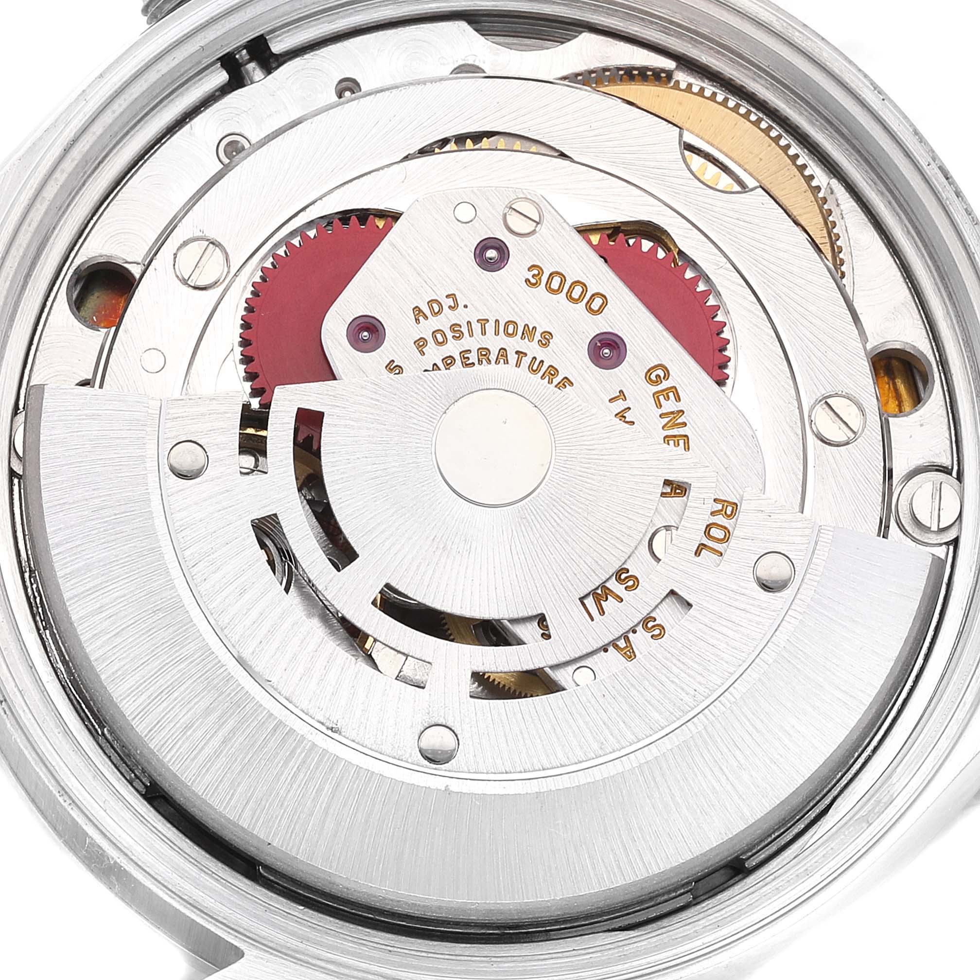 The image shows the internal mechanism of a Rolex Air-King 14000 Men's Stainless Steel Blue Dial 14000 Men's Stainless Steel Blue Dial watch from a close-up, revealing gears and adjustment markings.