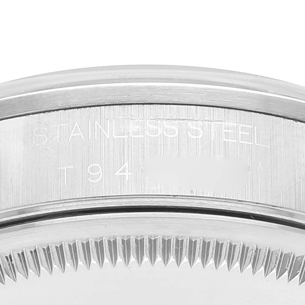 This image shows a close-up of the side of the bezel and case of a Rolex Air-King 14000 Men's Stainless Steel Blue Dial 14000 Men's Stainless Steel Blue Dial watch, highlighting the stainless steel material.