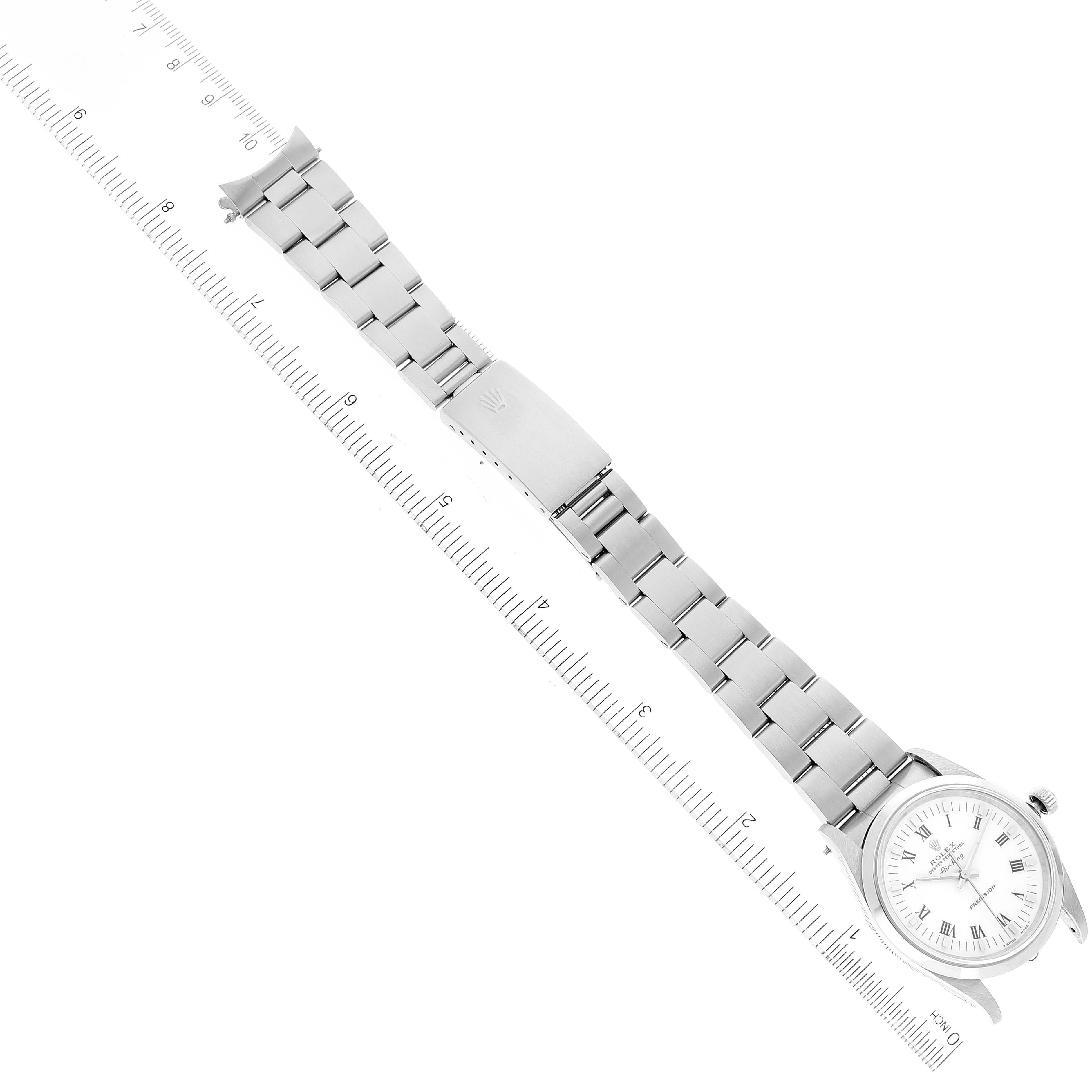 The image shows a Rolex Air-King 14000 Men's Stainless Steel White Dial 14000 Men's Stainless Steel White Dial watch laid flat with a metal bracelet, next to a ruler for scale.