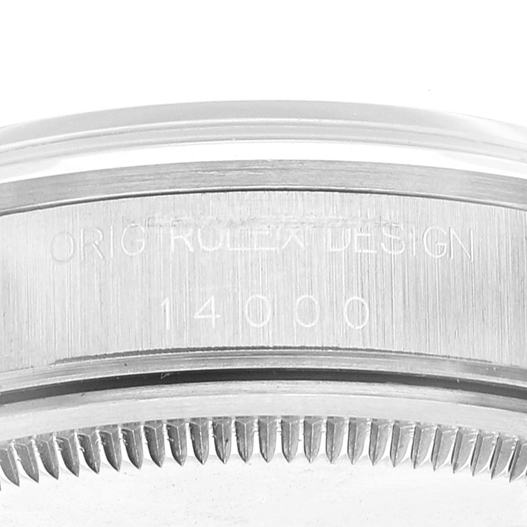 This image shows the side view of the bezel and case of a Rolex Air-King 14000 Men's Stainless Steel White Dial 14000 Men's Stainless Steel White Dial watch, displaying the engraved model number.