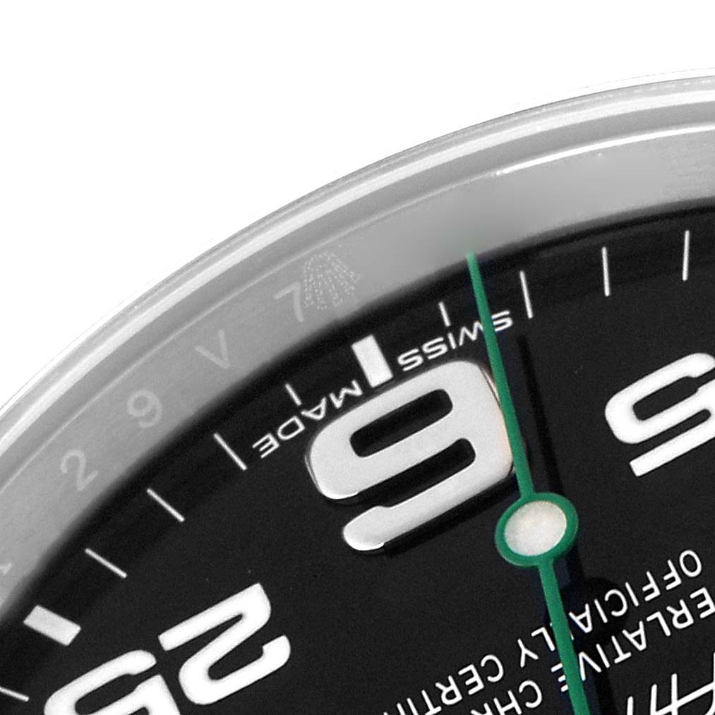 The image shows a close-up angle of the Rolex Air-King 116900 Men's Stainless Steel Black Dial 116900 Men's Stainless Steel Black Dial watch face, highlighting the numbers and part of the second hand.