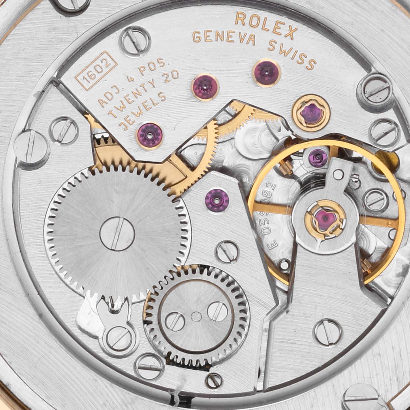 This close-up image shows the intricate movement and inner workings of the Rolex Cellini 5115 Men's Yellow Gold Black Dial 5115 Men's Yellow Gold Black Dial watch.