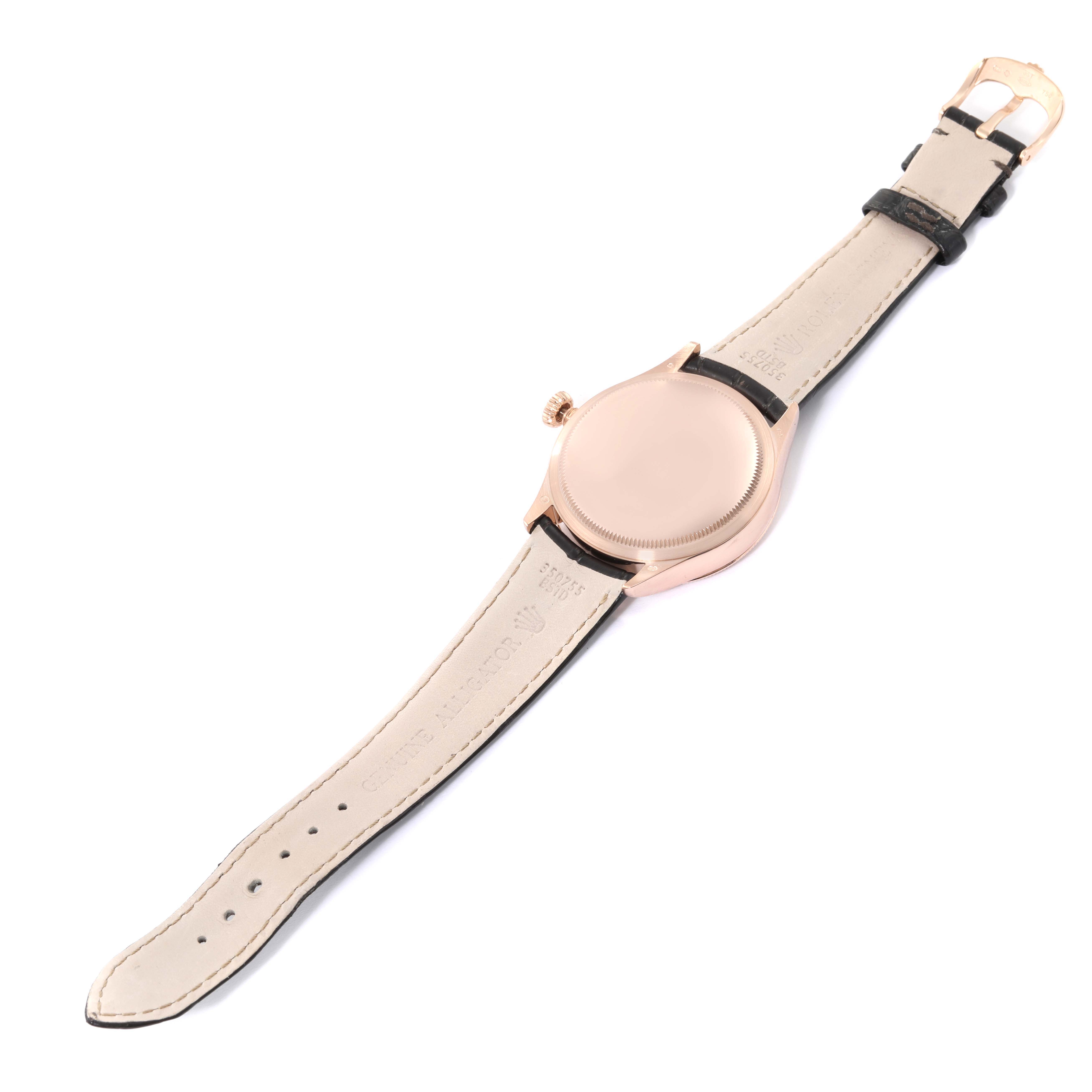 This image shows the back view of a Rolex Cellini 50525 Men's Rose Gold Brown Dial 50525 Men's Rose Gold Brown Dial model watch, featuring its case back and leather strap.