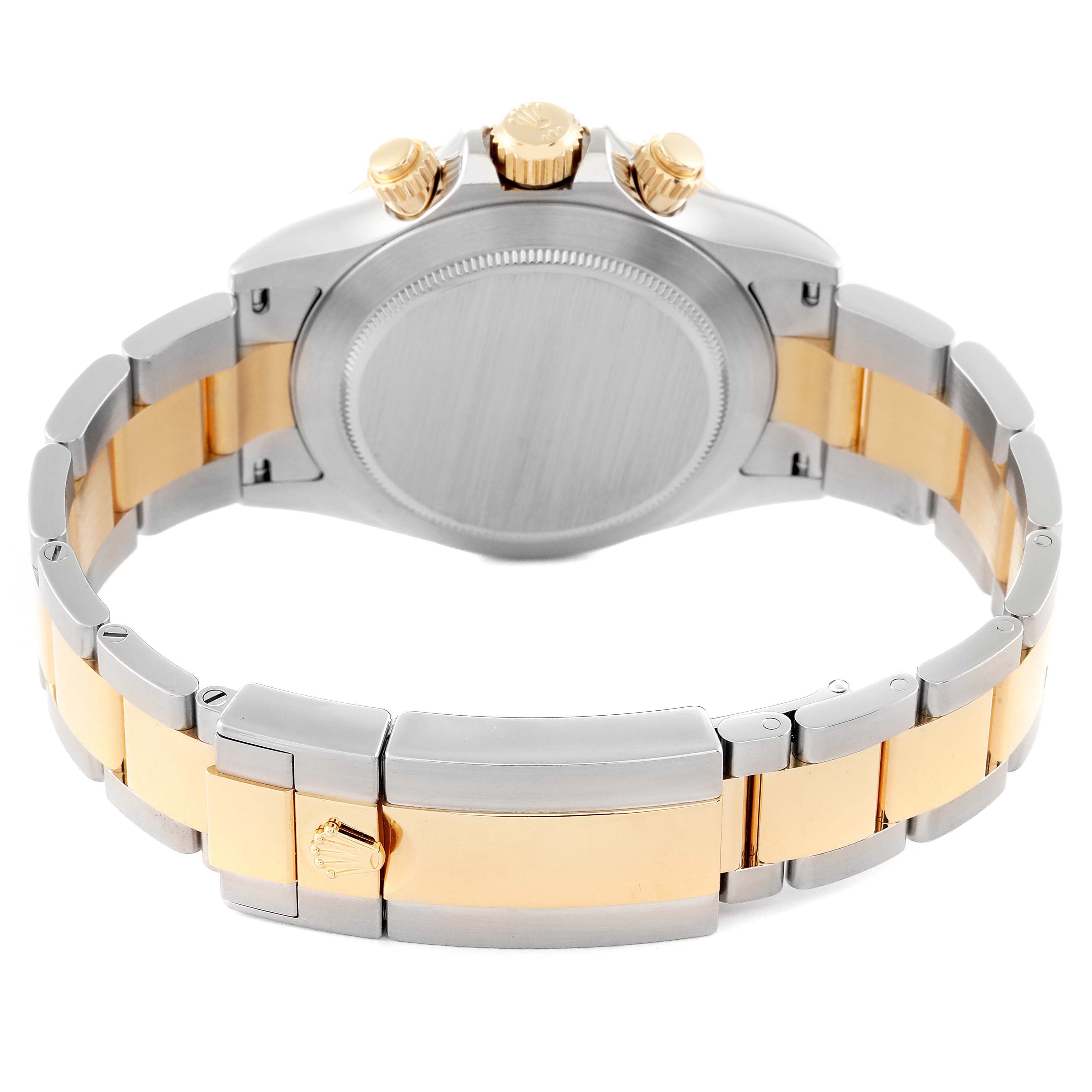 This image shows the backside, crown, and bracelet of the Rolex Daytona 116503 Men's Steel and Gold (two tone) Champagne Dial 116503 Men's Steel and Gold (two tone) Champagne Dial watch.