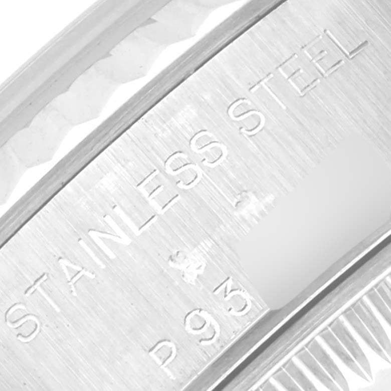 This image shows a close-up of the engraved text on the inside case of a Rolex Datejust 79174 Women
s Stainless Steel Silver Dial 79174 Women
s Stainless Steel Silver Dial watch, emphasizing "STAINLESS STEEL."